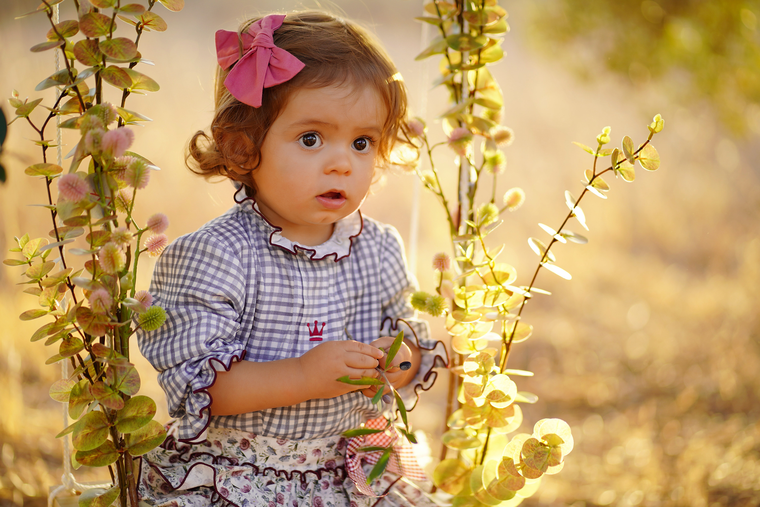 Lola bautizo para album. Fotógrafo de bodas y familias en España, Málaga, Marbella