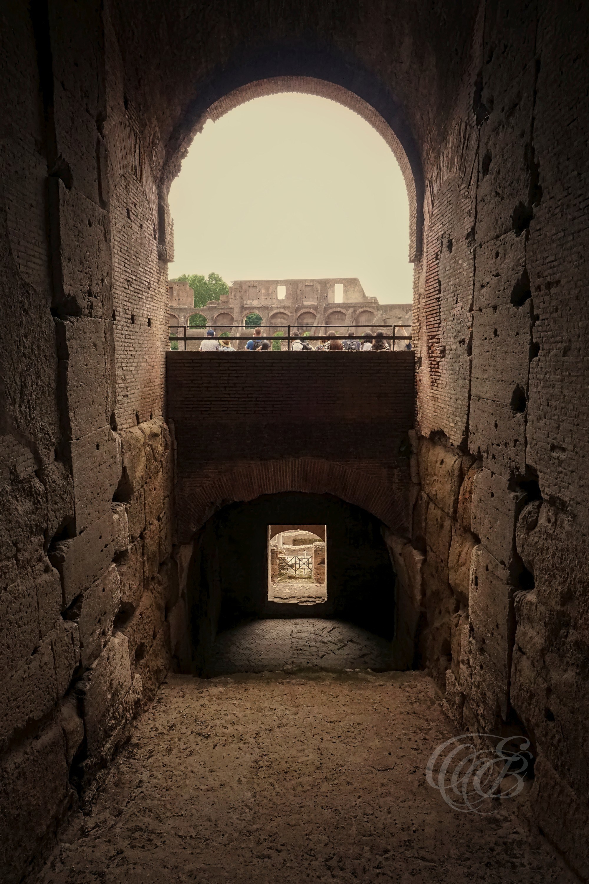 Rome, Italy — Ancient Colosseum Passageways — Eduardo Bartoli Photography — Photograph of interior archways and passageways within the Colosseum, revealing the circulation routes and structural design of the ancient Roman amphitheater in Rome, Italy — Rome, Italy — Ancient Colosseum Passageways — Eduardo Bartoli Photography.