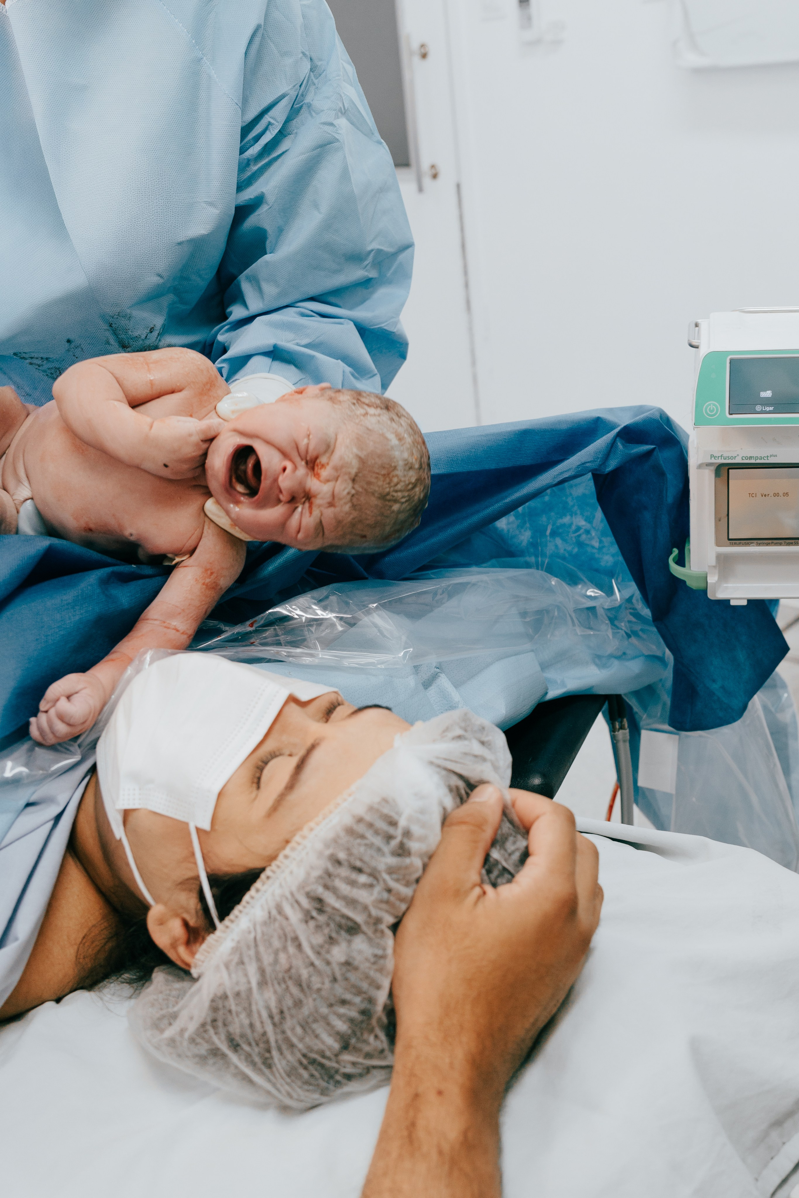 Fotos e filme de partos & famílias