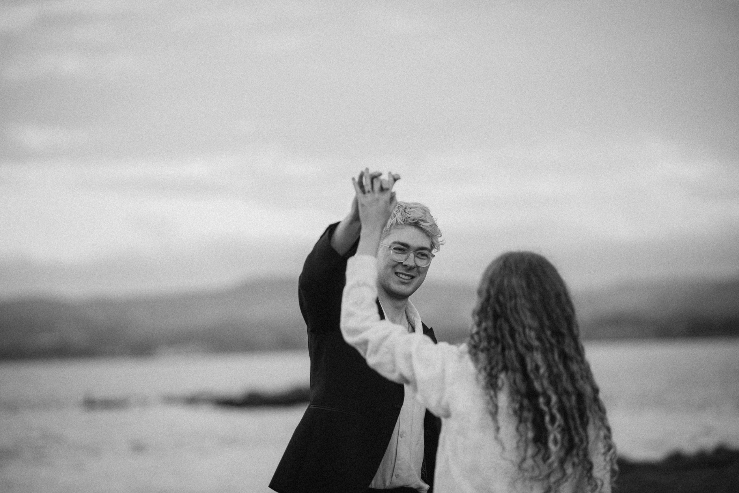 engaged couple dancing