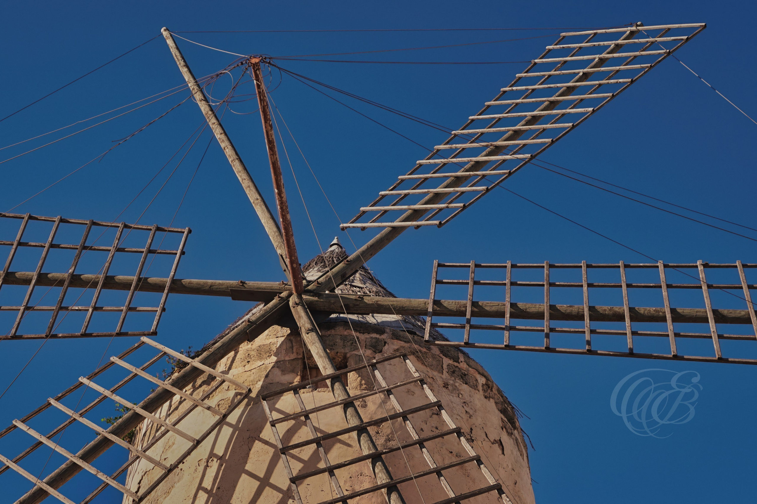 El Molí d’en Garleta, a historic windmill structure that forms part of the island’s traditional rural landscape, reflecting Mallorca’s agricultural past and its relationship with wind-powered architecture. The site stands as a preserved element within the surrounding environment. Eduardo Bartoli Photography.