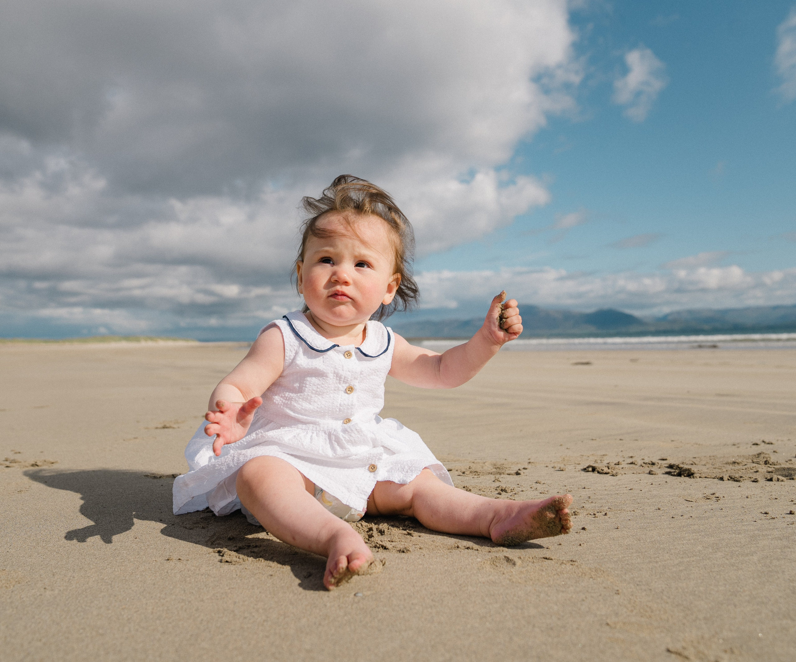 Darya and Mia at the ocean. Wedding and family photographer Ireland