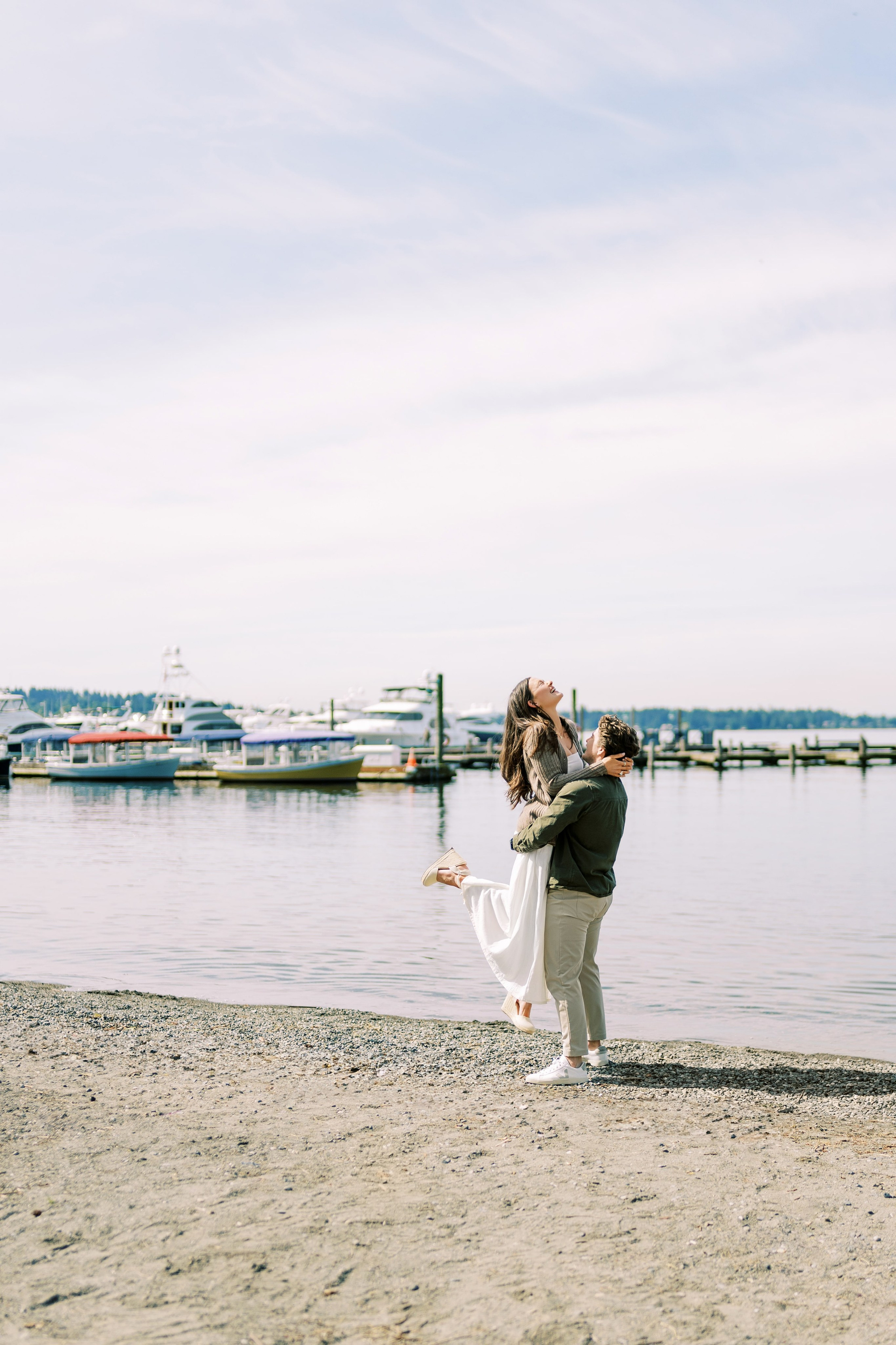 Engagement photo shoot Jake & Caroline / May 2024. Marina Park|Kirkland, WA. EVAN ARISTOV WEDDING PHOTOGRAPHY — Seattle Wedding Photographer