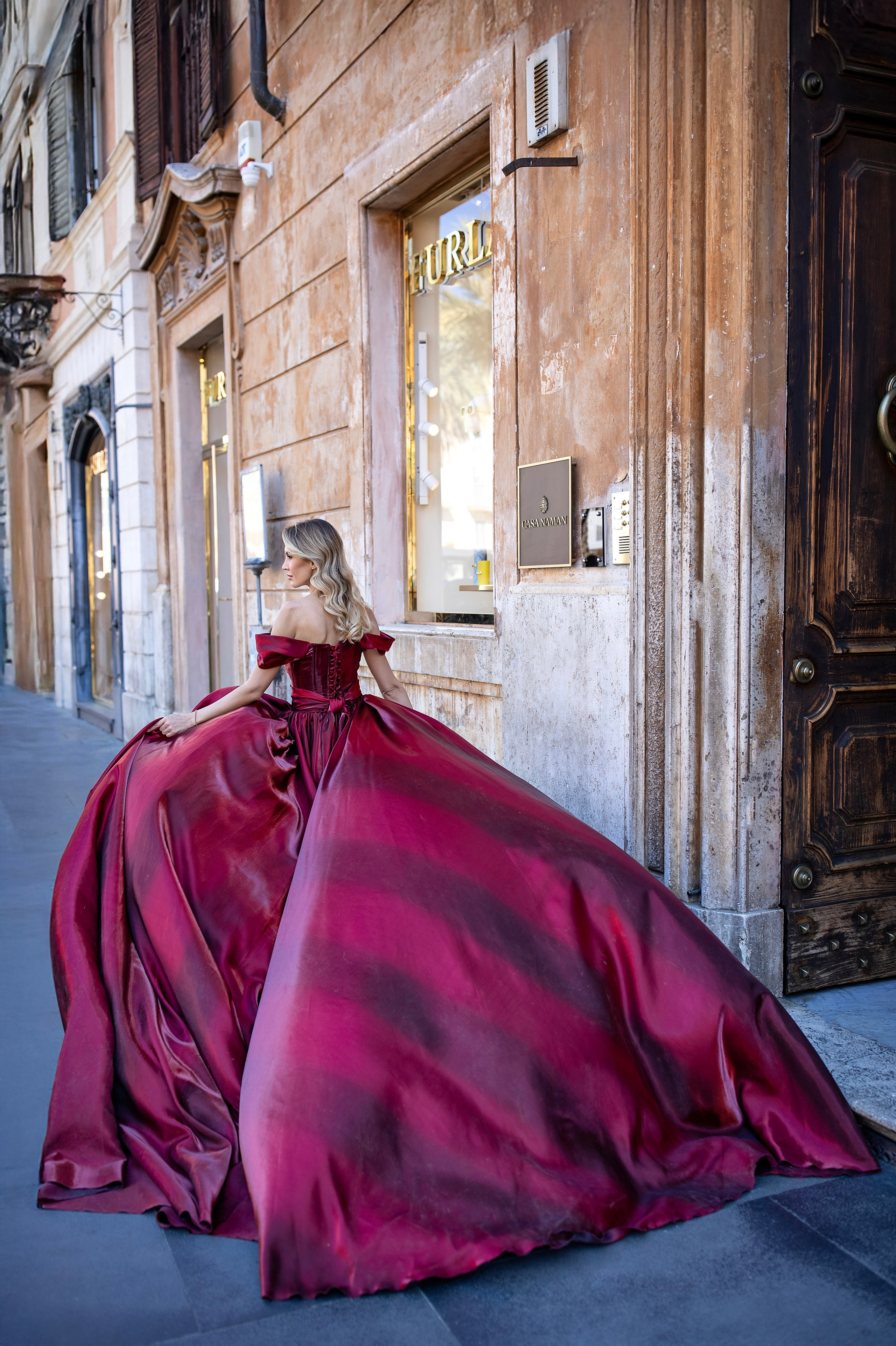 Flying dress photoshoot with a woman in Rome