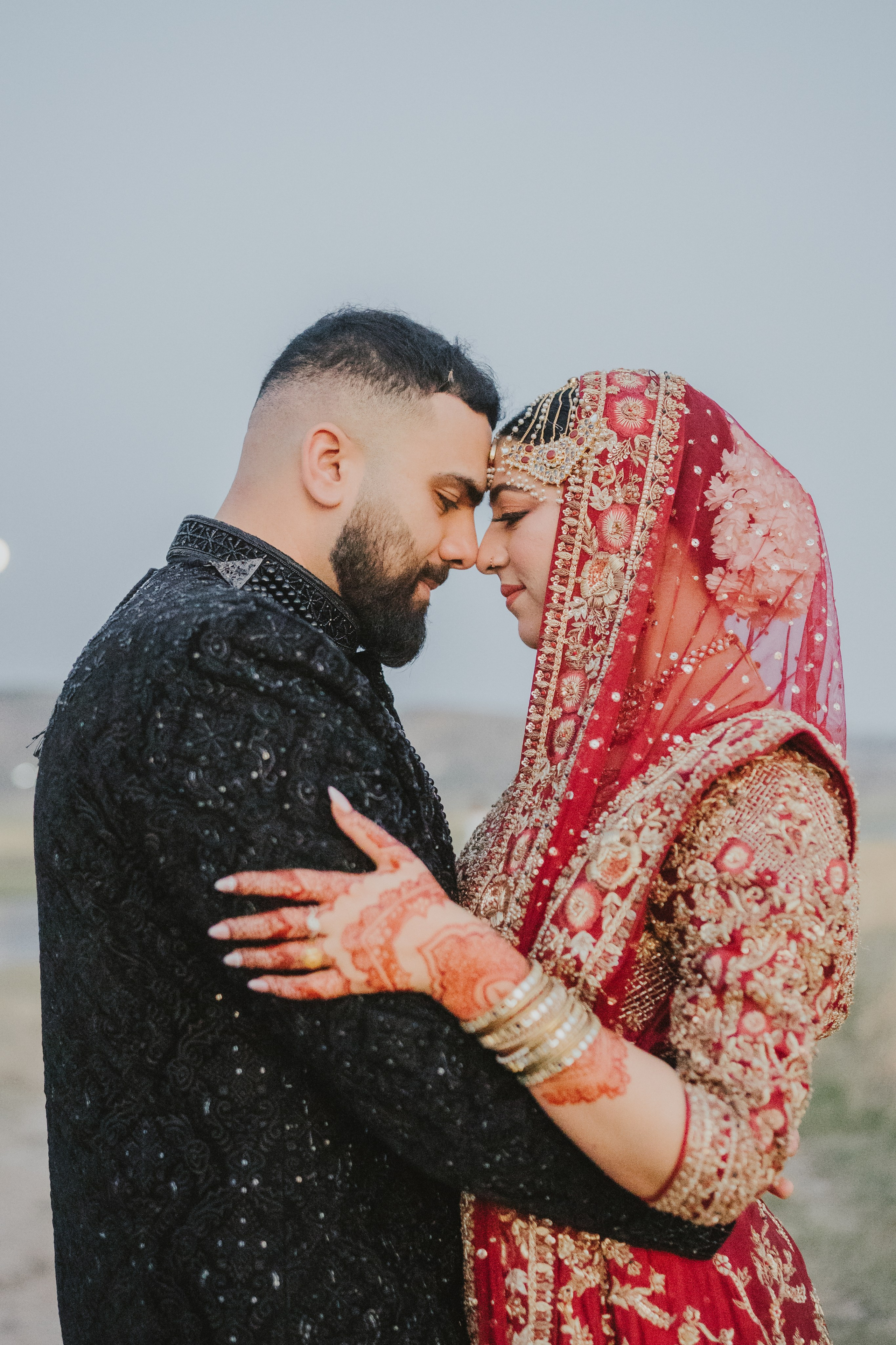 Couple shoot in the fields during sunset 