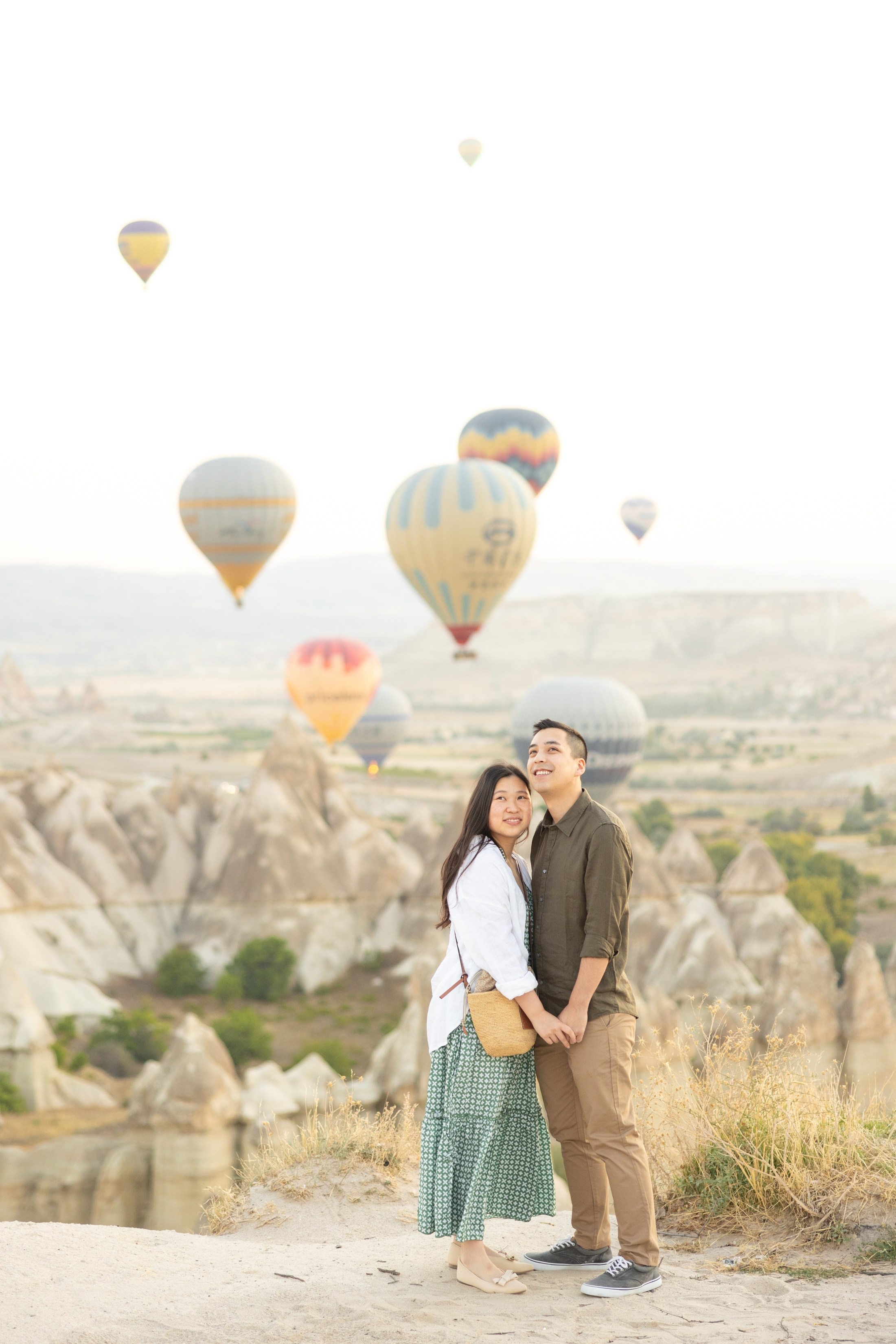 Romantic Love Story Photoshoot with Hot Air Balloons in Cappadocia. Julia Ganch I Fashion Wedding Photography I Cappadocia Turkey