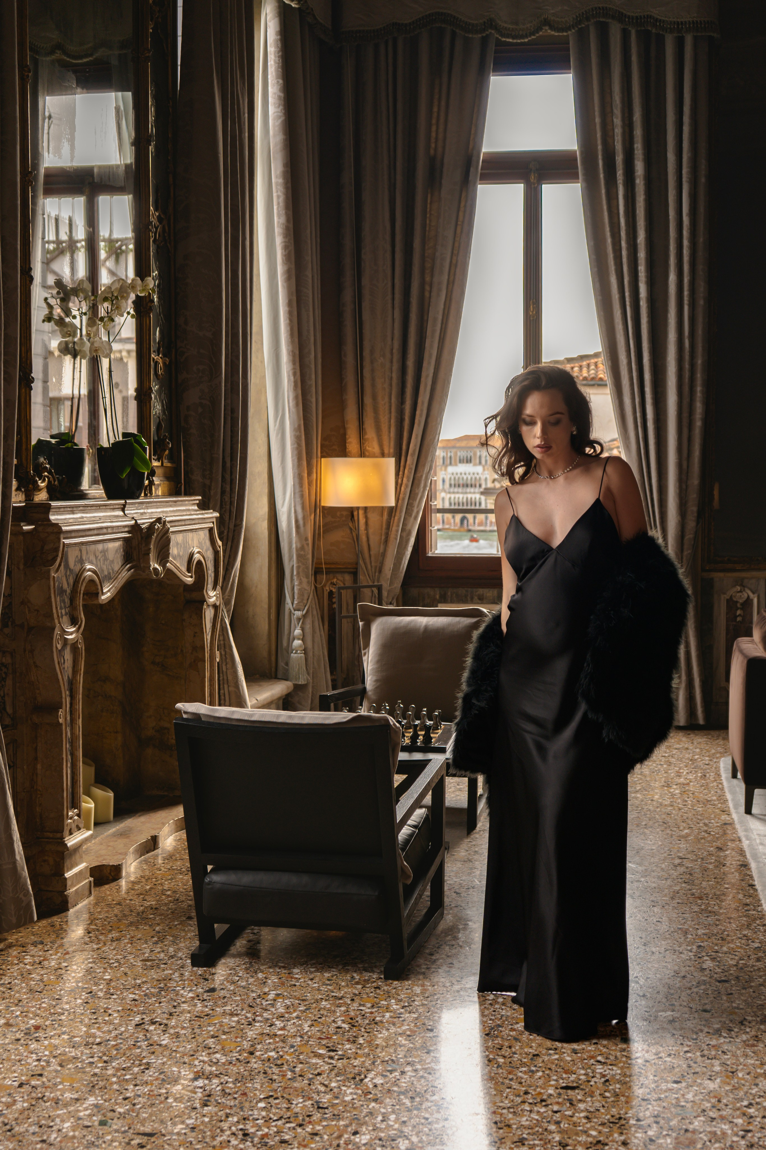 Branding photoshoot Venice for blogger in silk dress near Grand Canal