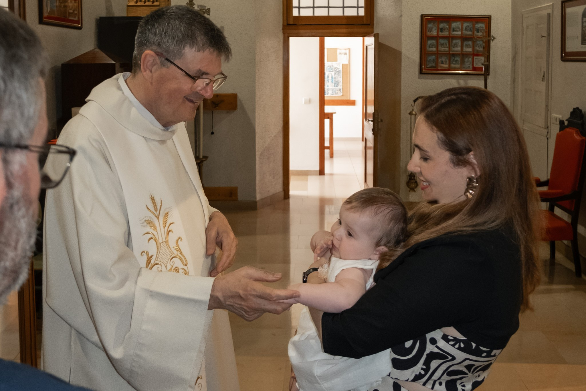 Bautizo. Fotografía profesional en Calafell - Elena Medvedeva