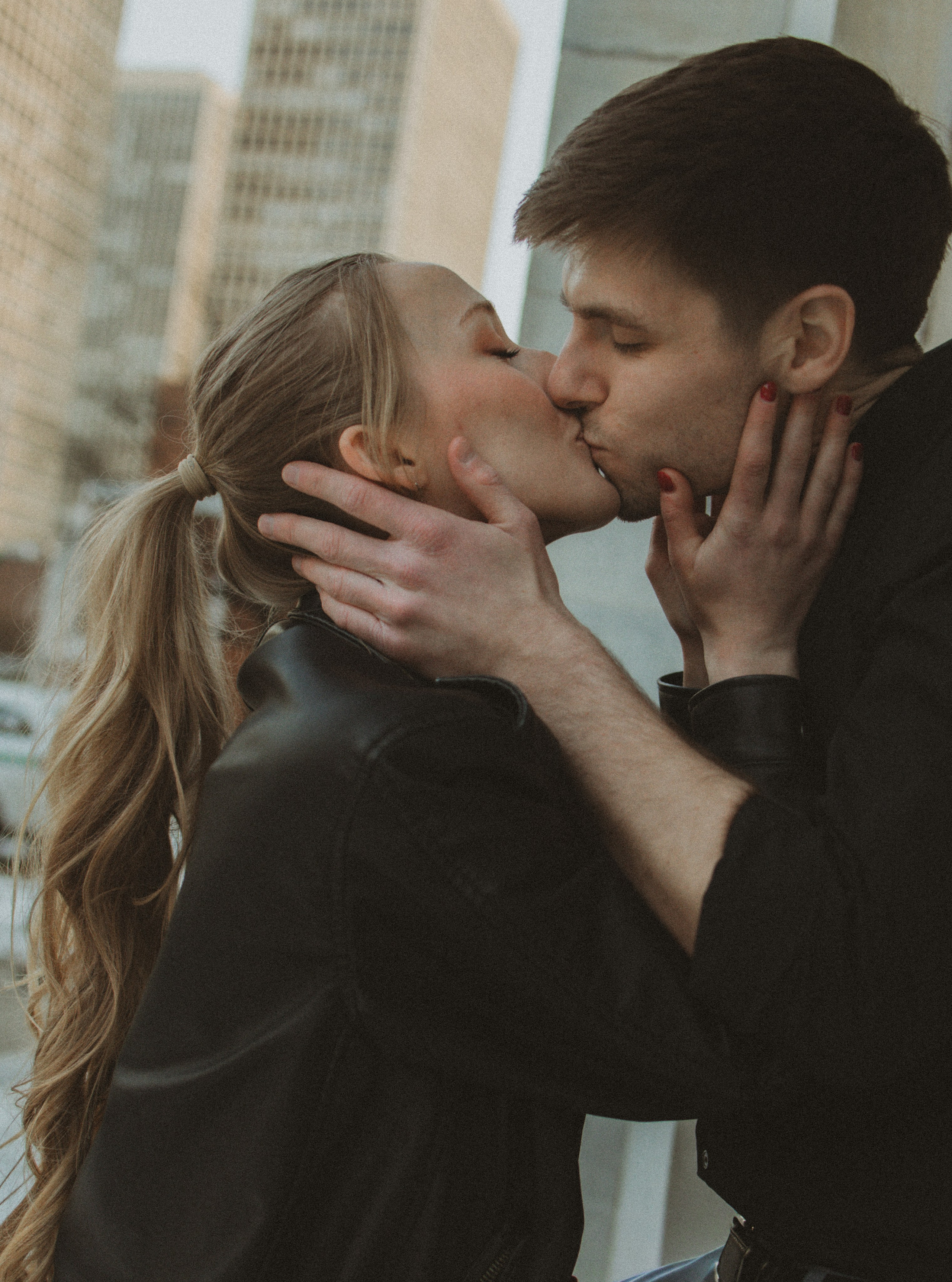 Romantic engagement couple kissing at sunset during their engagement session in Philladelphia 