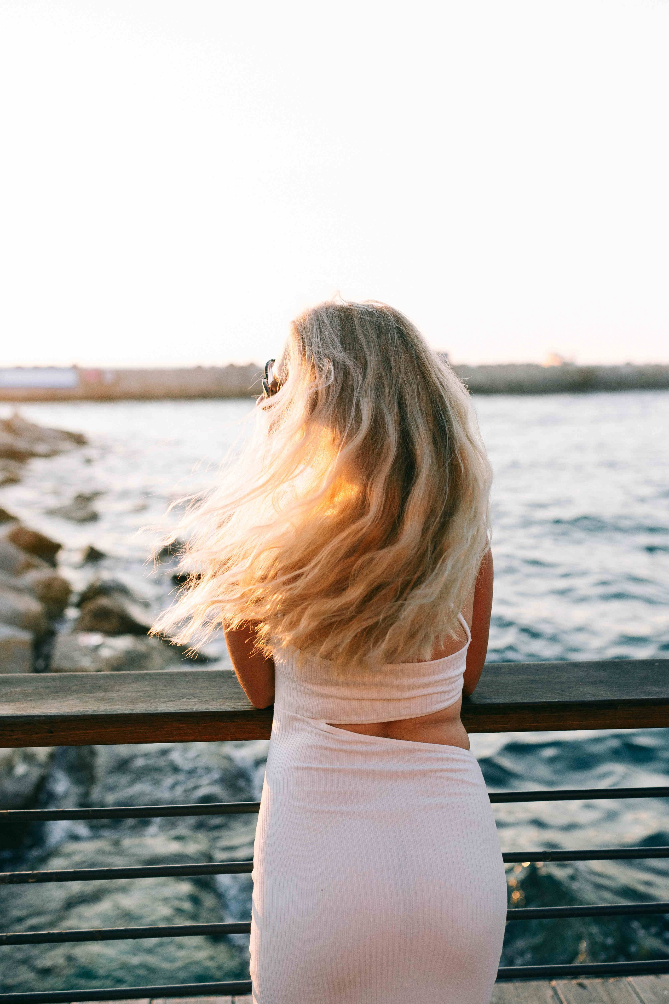 SUNSET IN JAFFO PORT. PHOTOGRAPHER IN ISRAEL