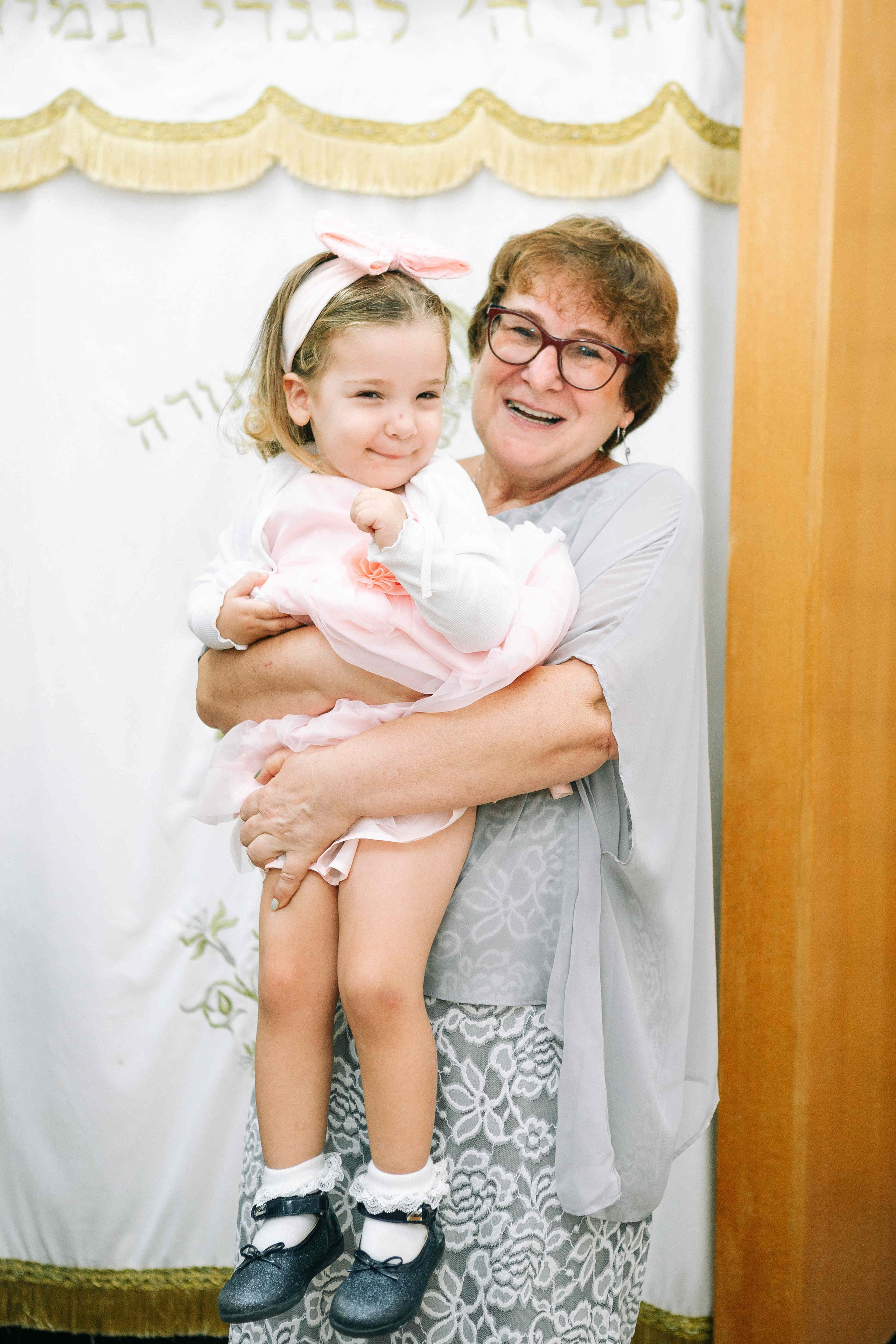 BRITH MILA IN THE SMALL SYNAGOGUE. PHOTOGRAPHER IN ISRAEL