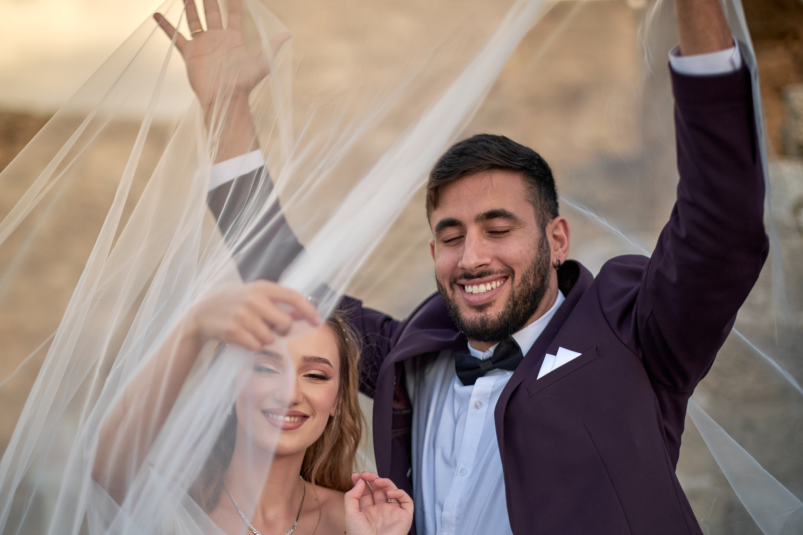 Love Story , wedding Romantic wedding couple portrait, bride with veil and groom in suit, emotional wedding photography by Maxim Polak Israel
