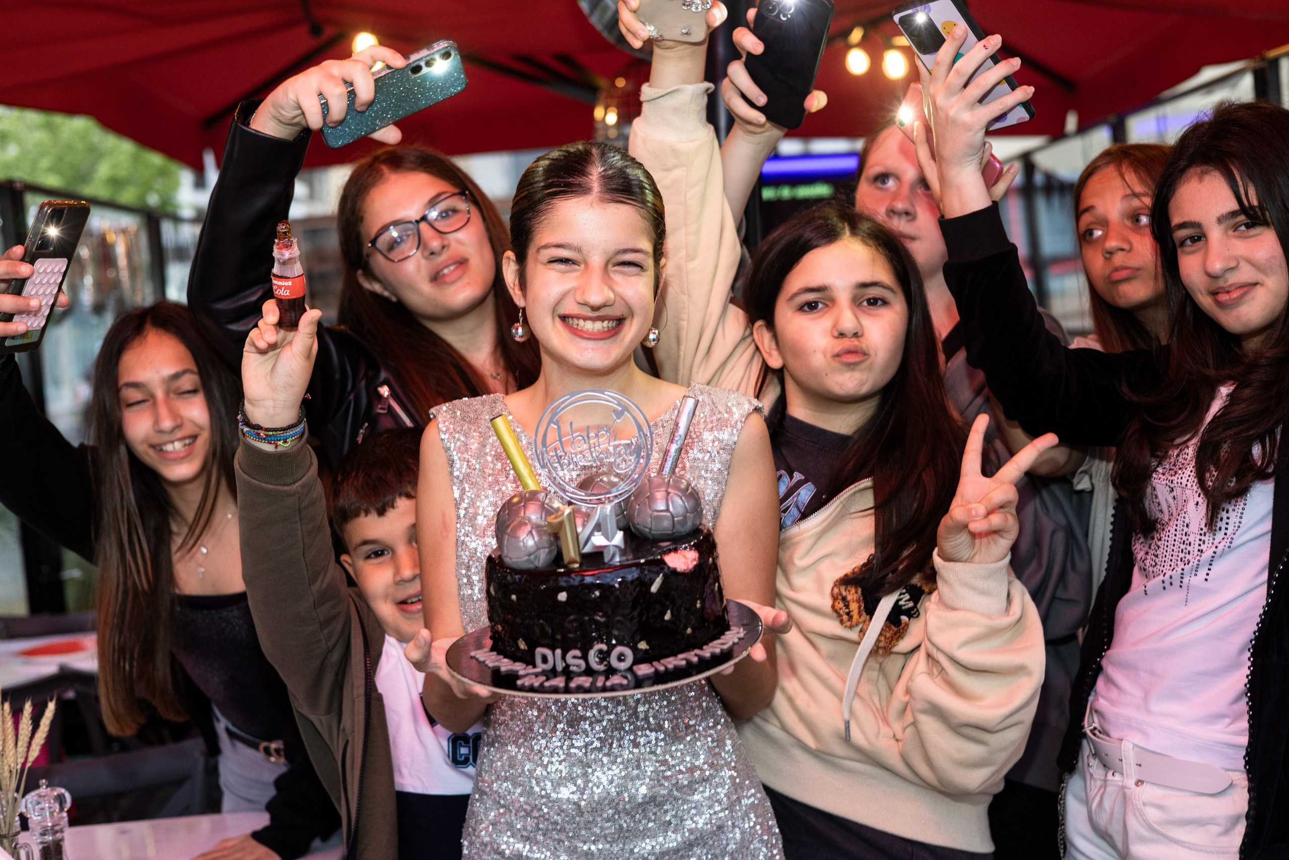 Teenagers celebrating together during a birthday party
