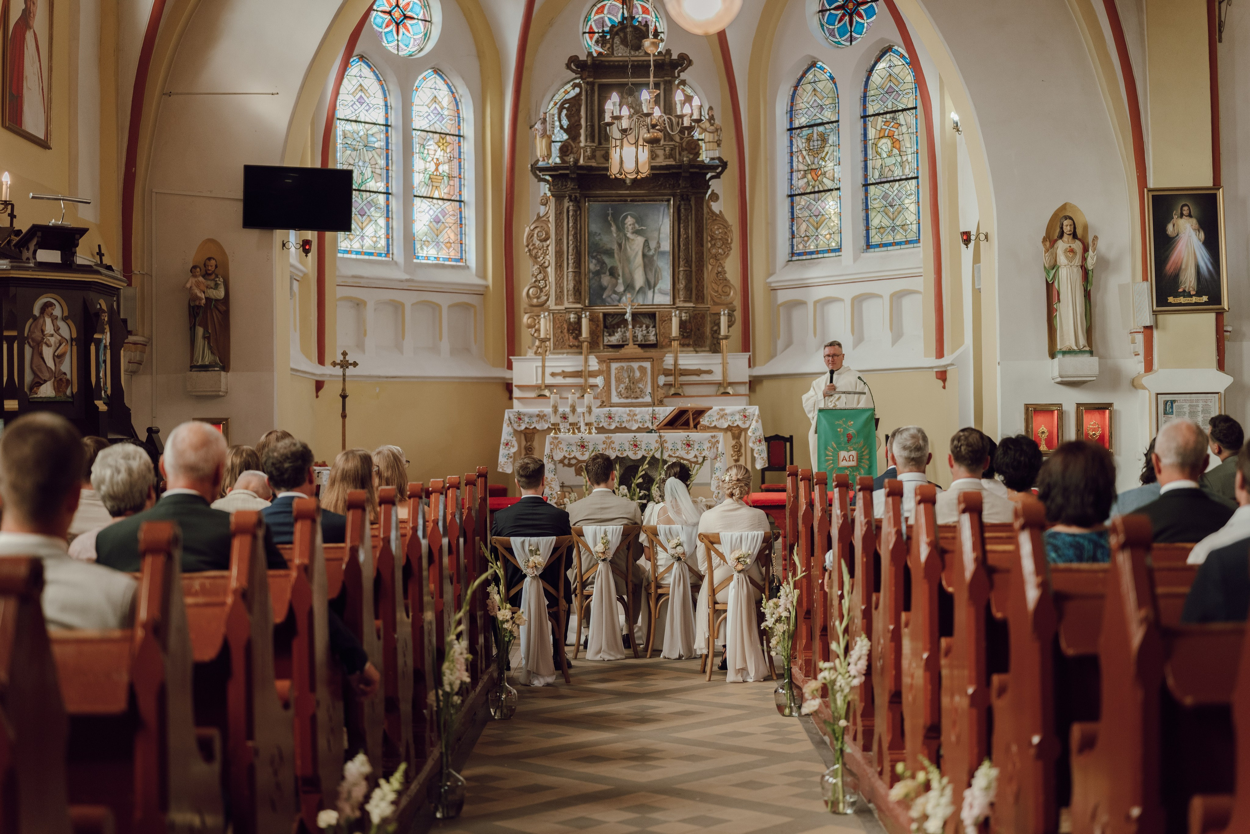 Ceremonia ślubna w kościele – reportaż ślubny w Poznaniu. Fotograf ślubny.