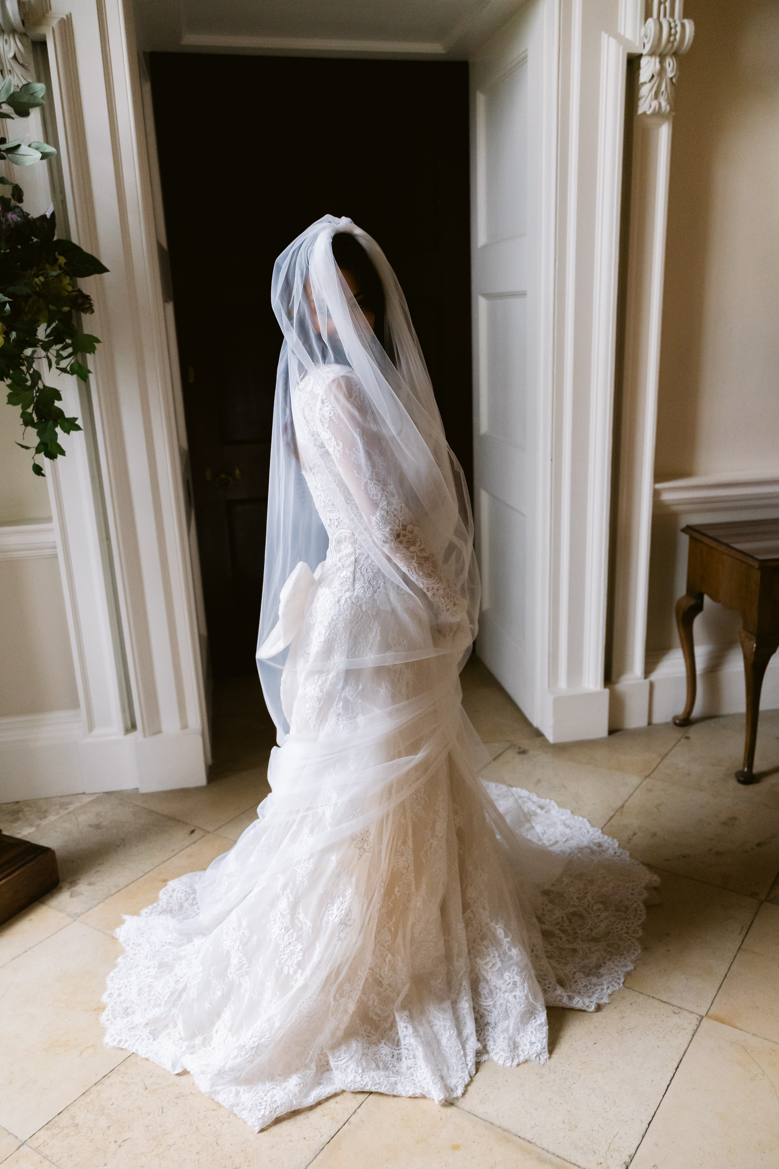 Elegant wedding portrait of bride and groom walking through the streets of ParisRomantic elopement moment captured in soft evening light in Paris, FranceLuxury wedding ceremony setup in a historic French venue with natural floralsCandid black and white photo of a couple at their city wedding in London, UKTimeless couple portrait in front of Marylebone Town Hall, LondonEditorial-style bridal preparation in a classic townhouse in the heart of LondonSoft light bridal portrait in a countryside château wedding in FranceFine art flat lay with French-inspired wedding details and vintage texturesCinematic golden hour photo at a UK estate wedding with historic architectureLuxury wedding tablescape with candles and florals at a London reception