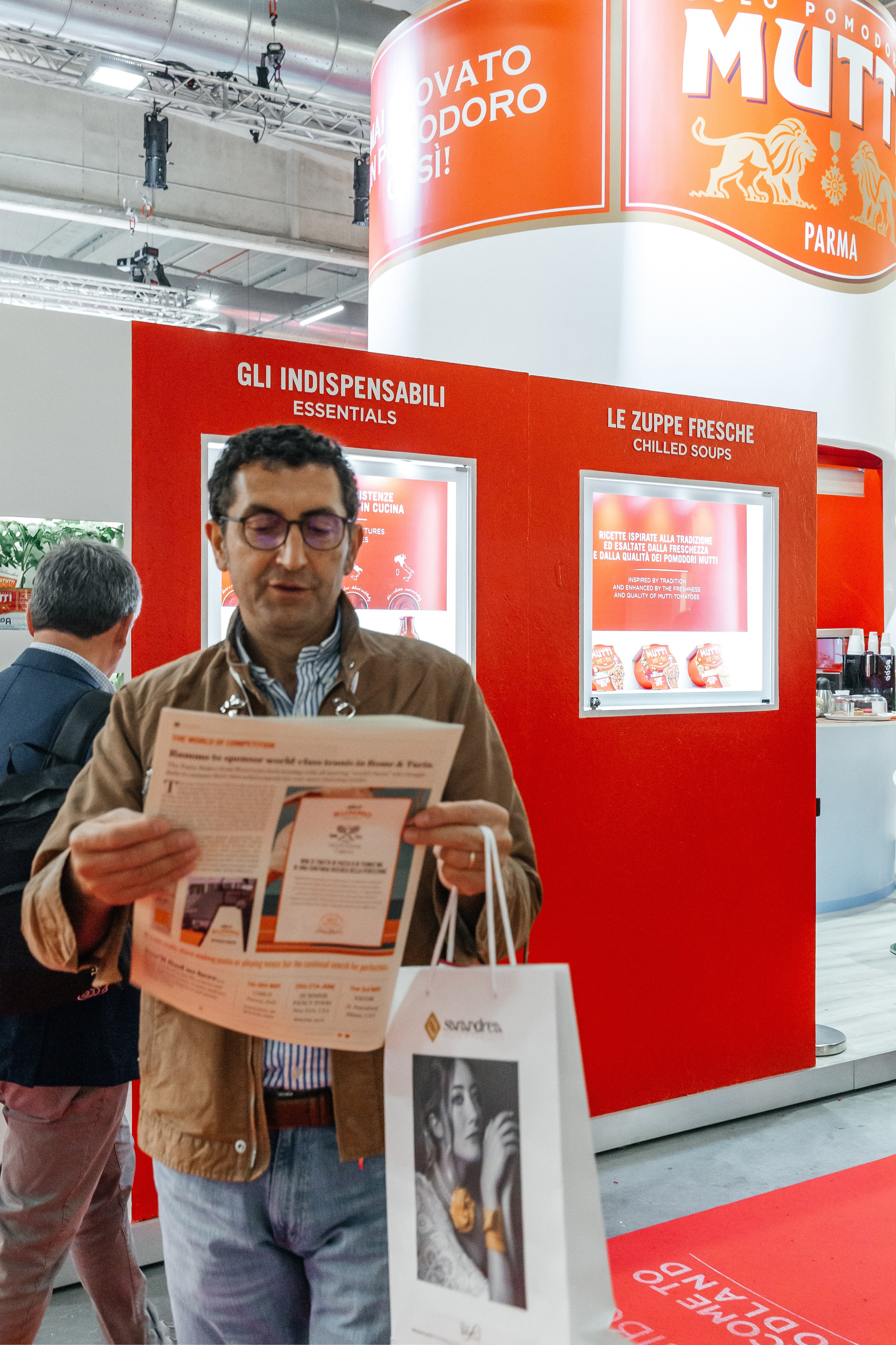 Stand dell'azienda Mutti alla fiera Cibus 2024 a Parma, Area interattiva dell'azienda Mutti alla fiera Cibus 2024