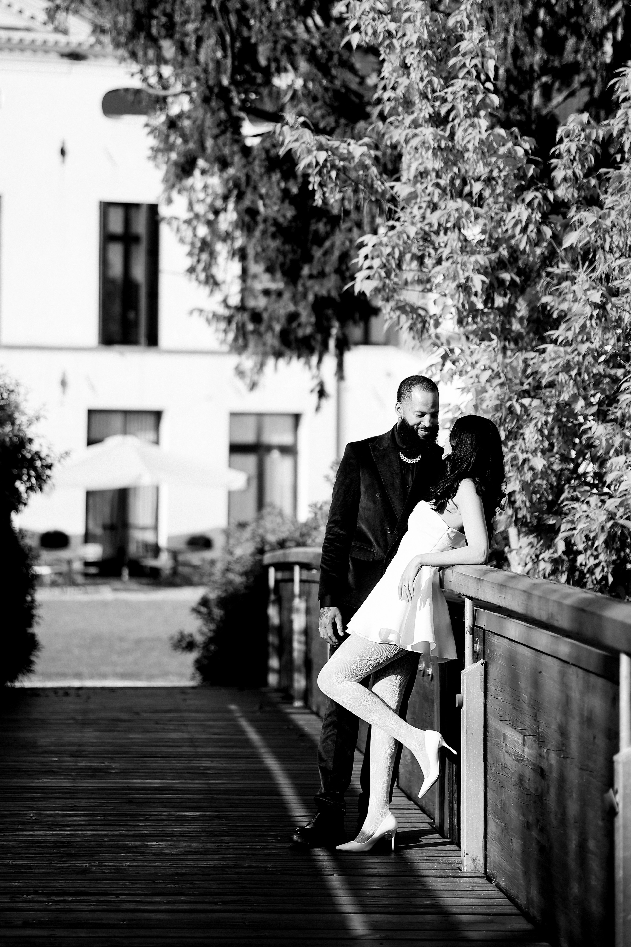 Bride and groom embracing at sunset in an Italian villa