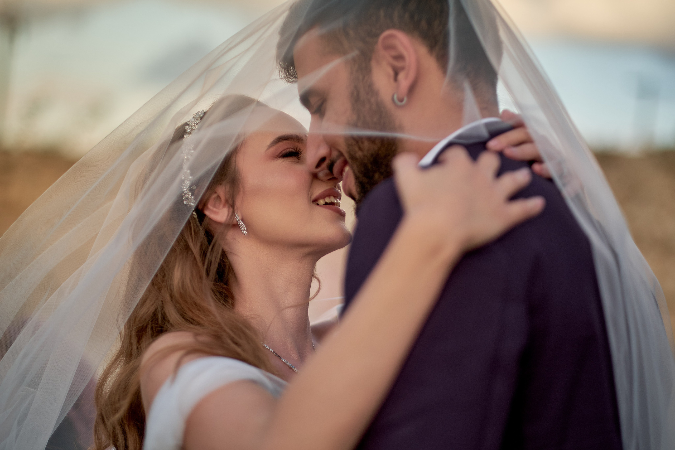 Love Story , wedding Romantic wedding couple portrait, bride with veil and groom in suit, emotional wedding photography by Maxim Polak Israel