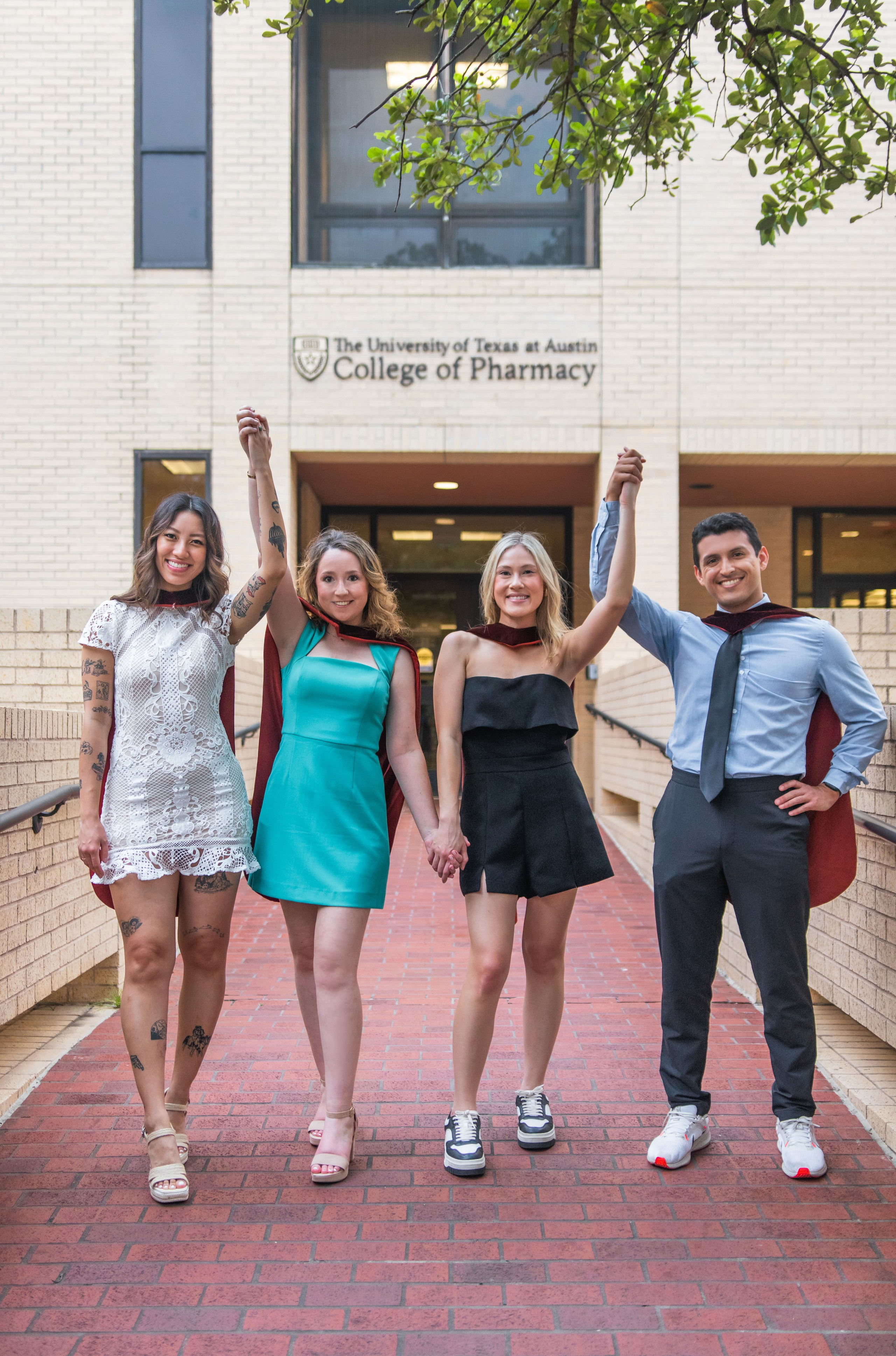 Group graduation photoshoot at the University of Texas Austin