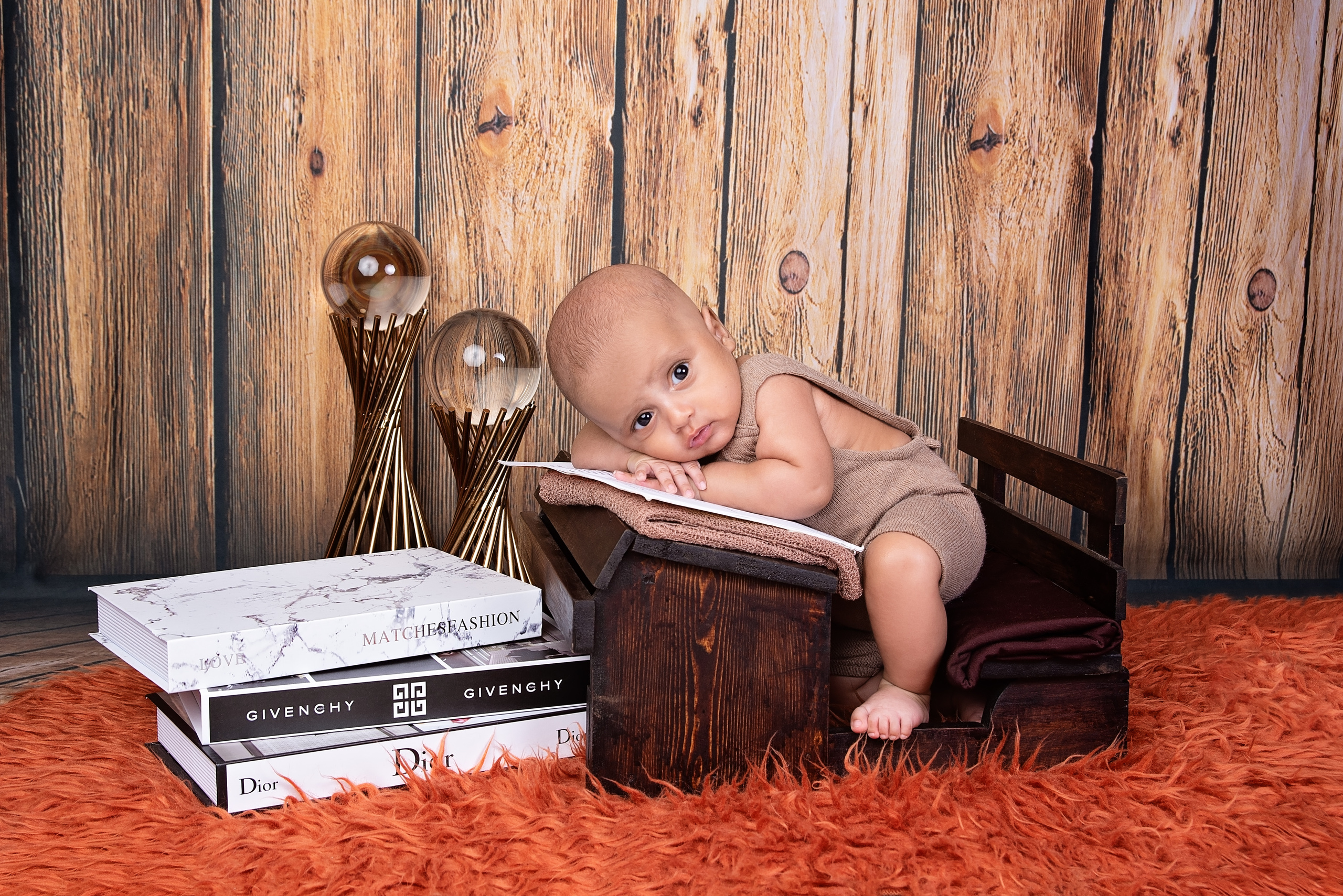 Black African Arabic newborn baby boy at the desk photo shoot Nairobi Mombasa Kenya