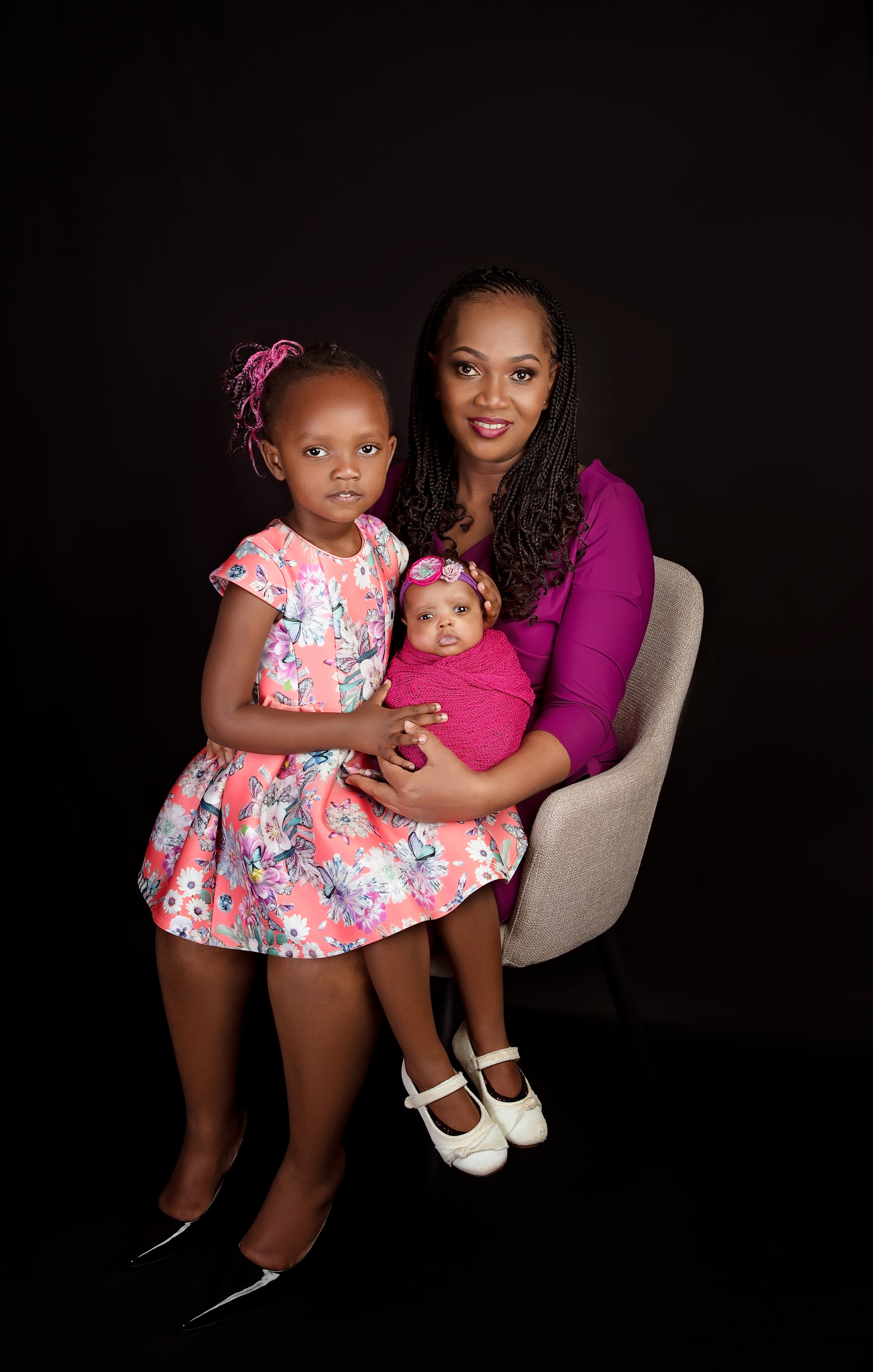 Black African family mother newborn baby girl and her sister photo shoot Nairobi Mombasa Kenya