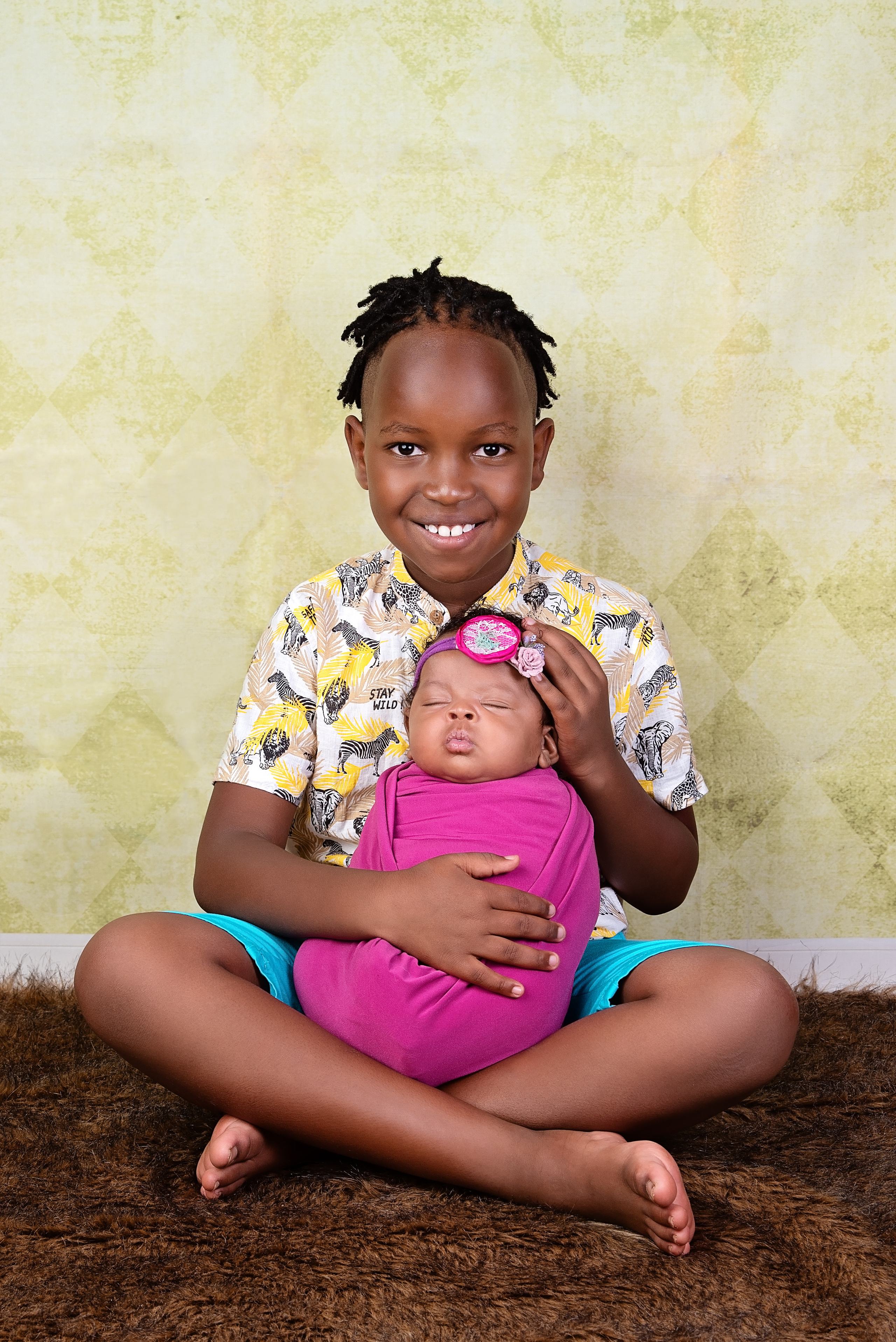 2 weeks African baby girl with 7 years brother newborn photo shoot Mombasa Kenya 