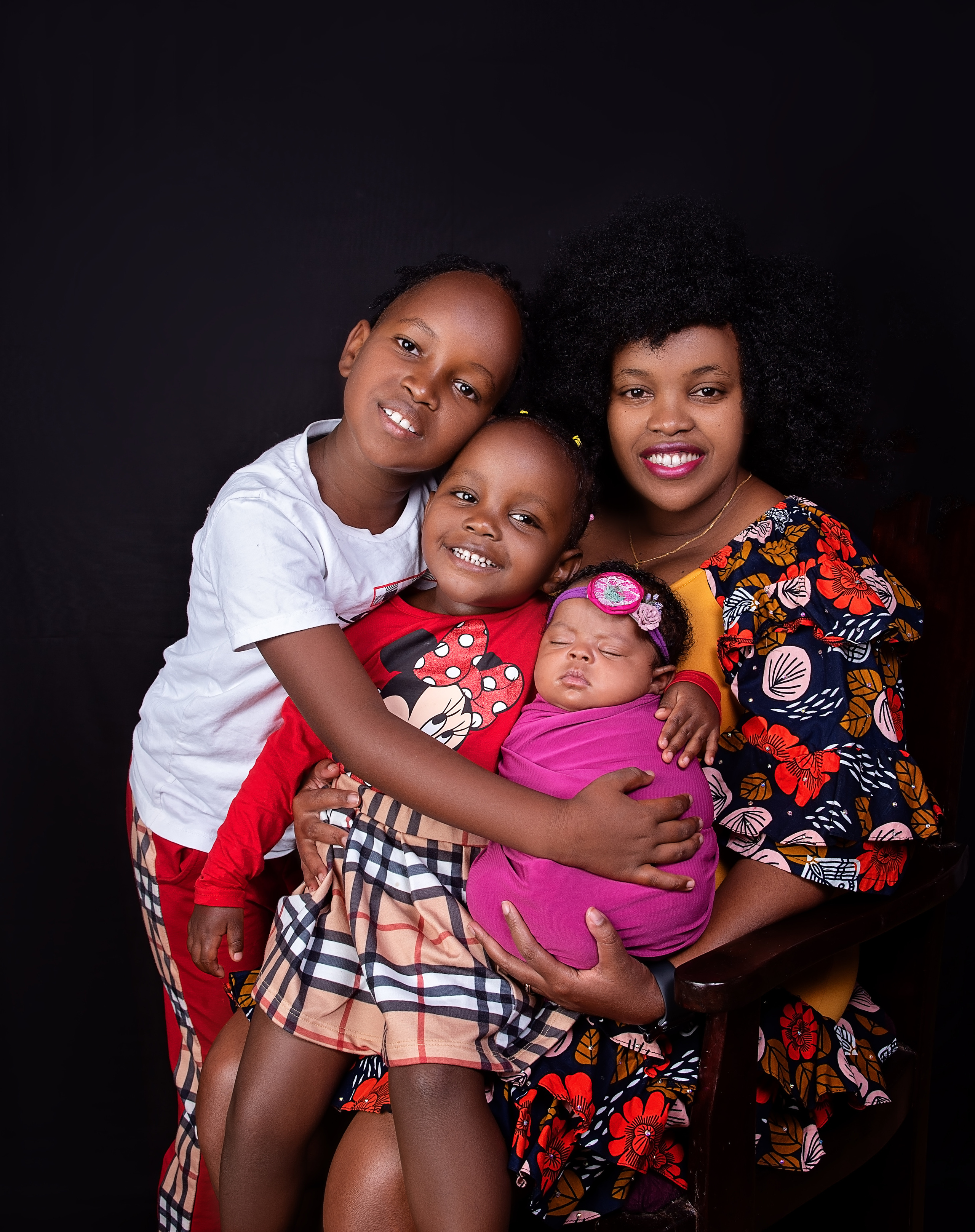 Black family with newborn baby girl brother sister photo shoot Nairobi Mombasa Kenya 