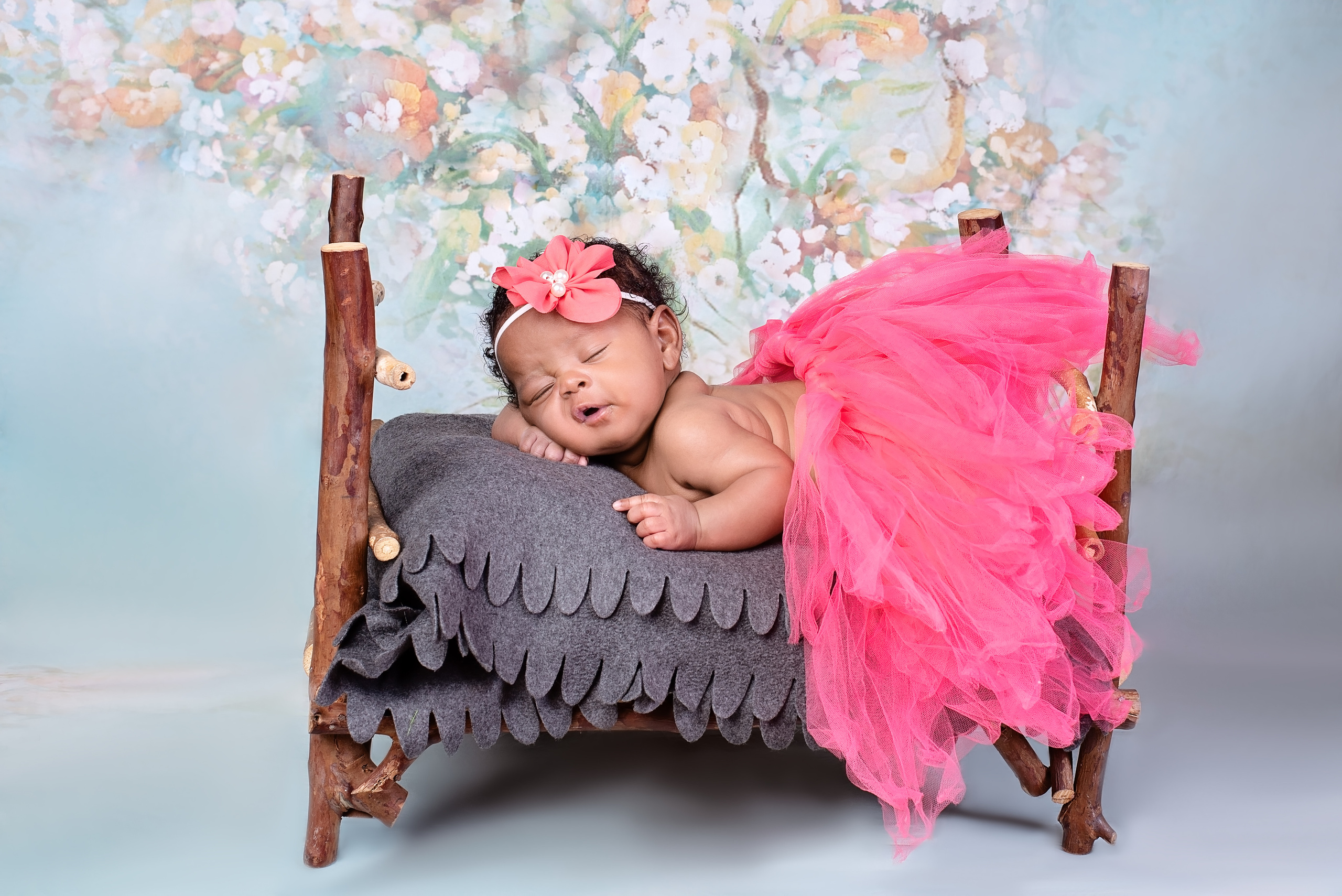 Beautiful newborn baby girl in the bed photo shoot Nairobi Kenya