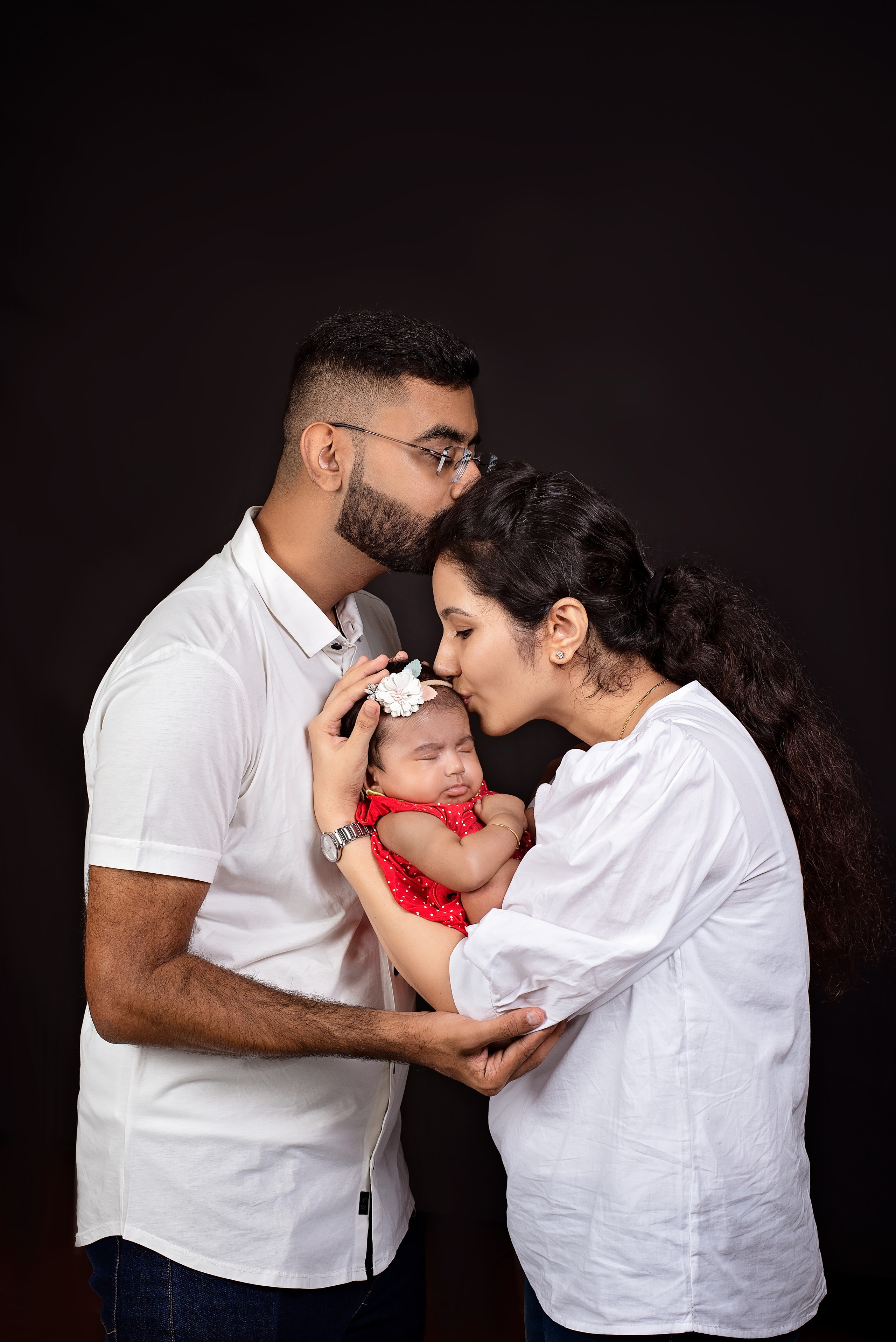 Asian Indian family father mother and baby girl photo shoot Mombasa Kenya