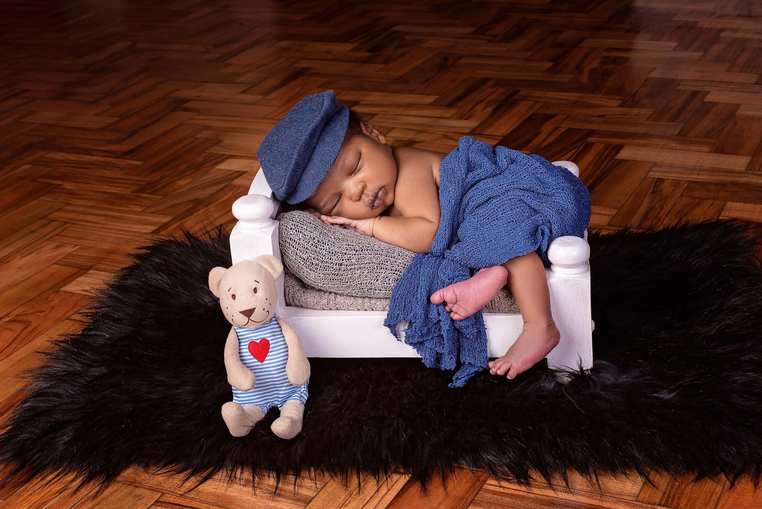 Sleeping 9 days newborn black baby boy photo shoot Mombasa Nairobi Kenya 