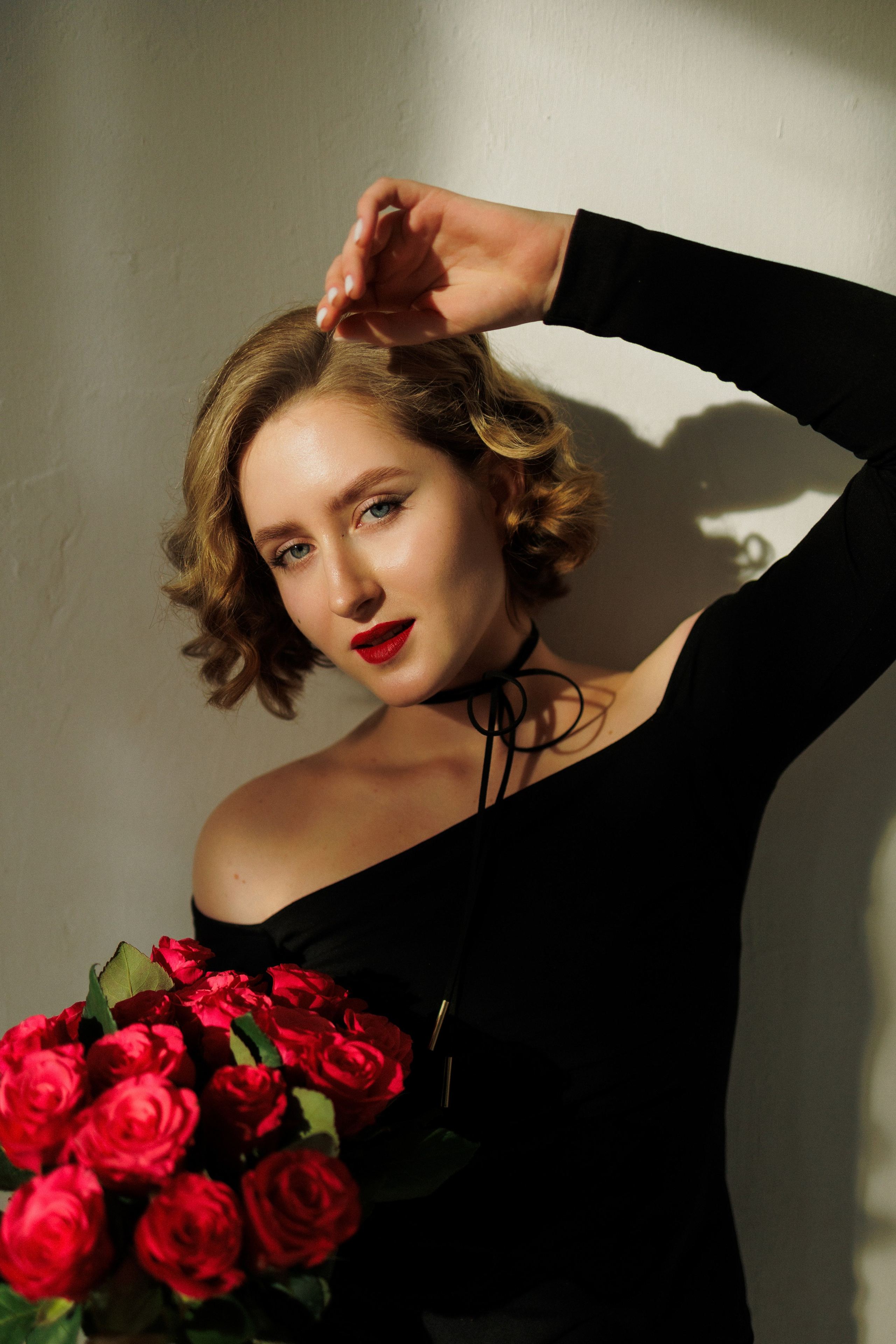 Soulful Studio Portrait. Woman in a Black Dress with Red Roses. Kristina Kozheltsova- Soulful Portrait&Lifestyle&Love Story Photographer in Leipzig, Germany