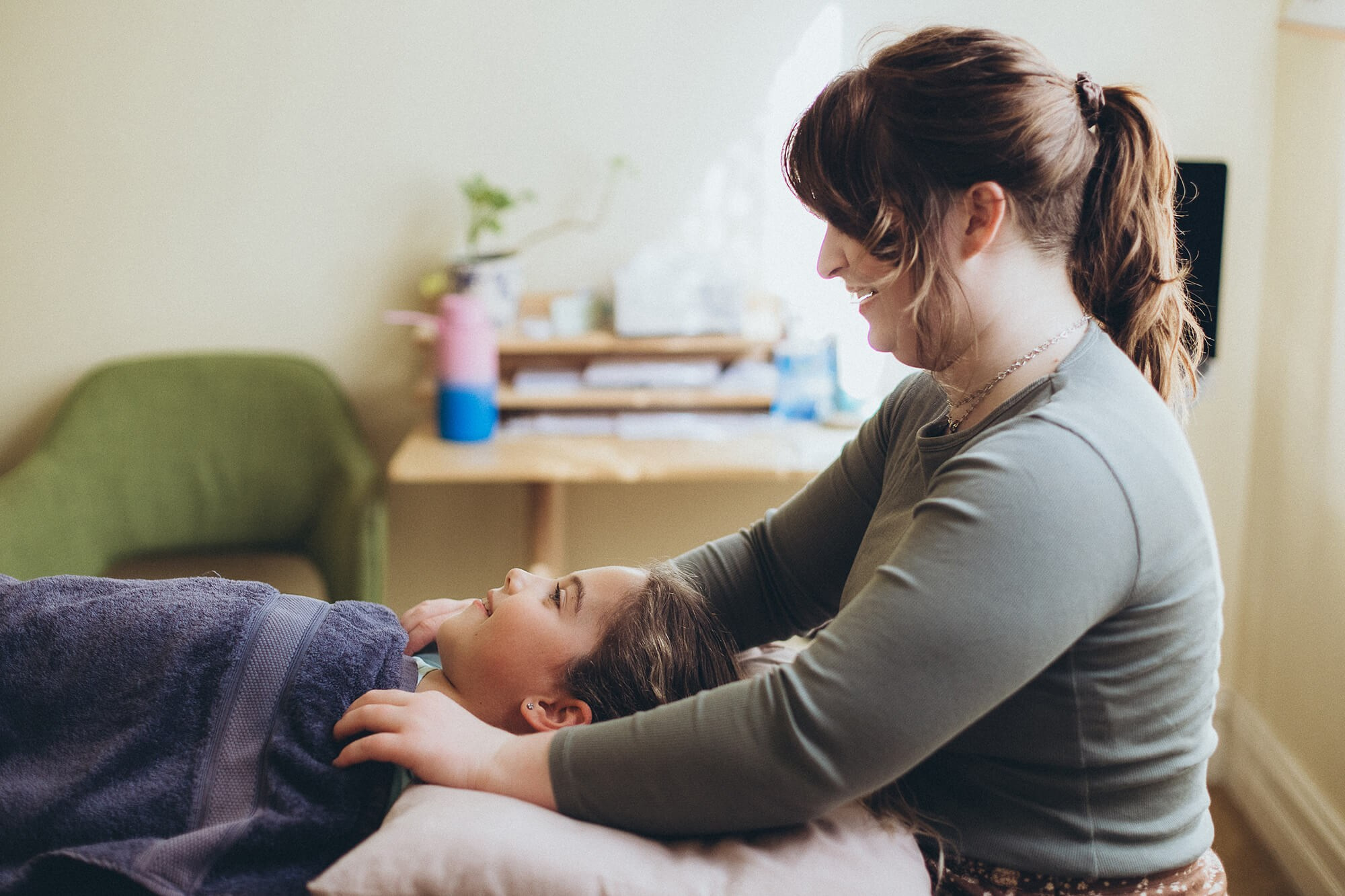 Hands-on treatment detail – commercial shoot in healthcare setting