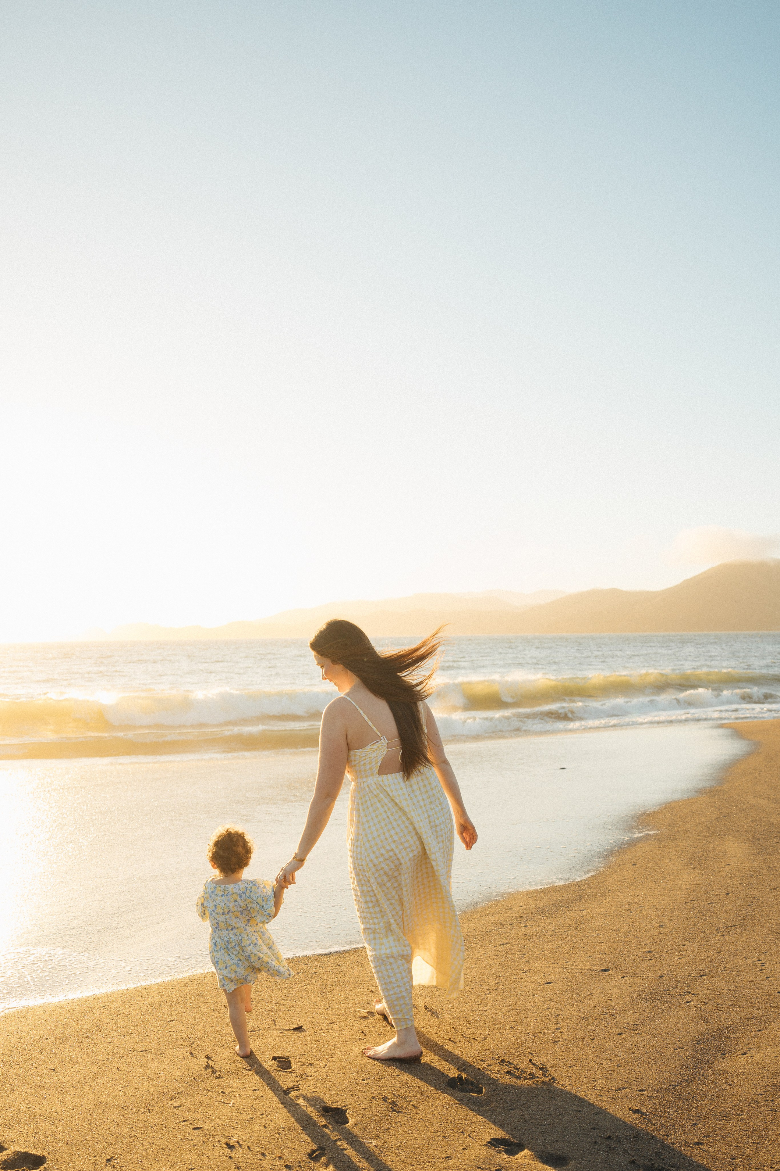 Bri’s growing family at Baker Beach. Soulo Photography | San Francisco Bay Area Based Photographer