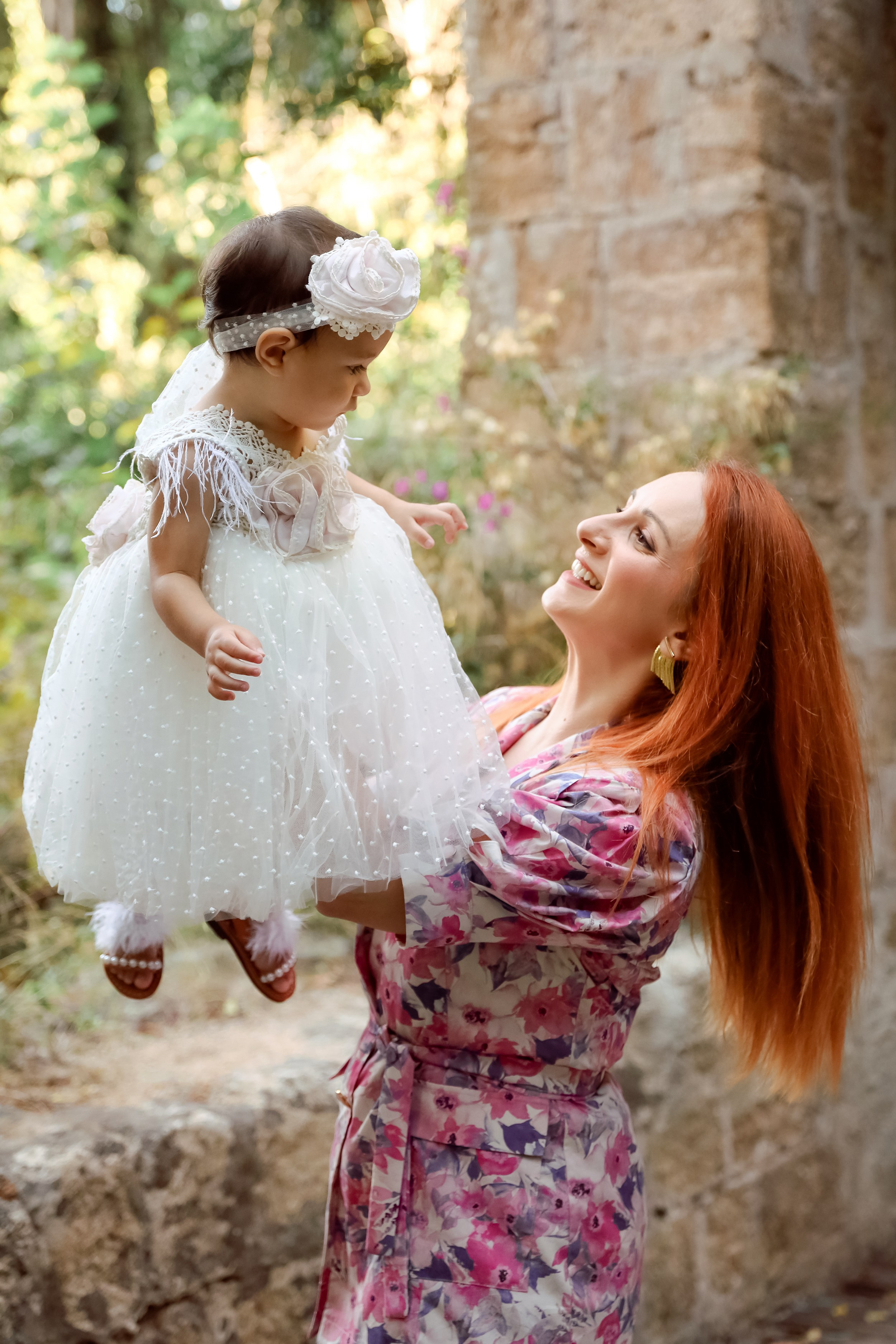 Mother is holding the daughter in her arms and happy. Greece, Rhodes island