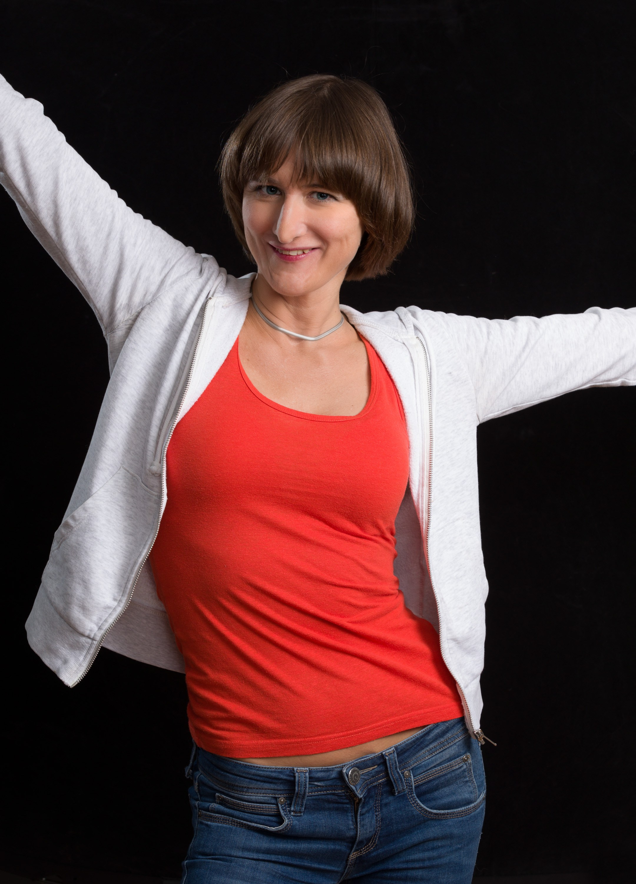 Portrait of a young lady on black studio background - photographer Andrey Dunin