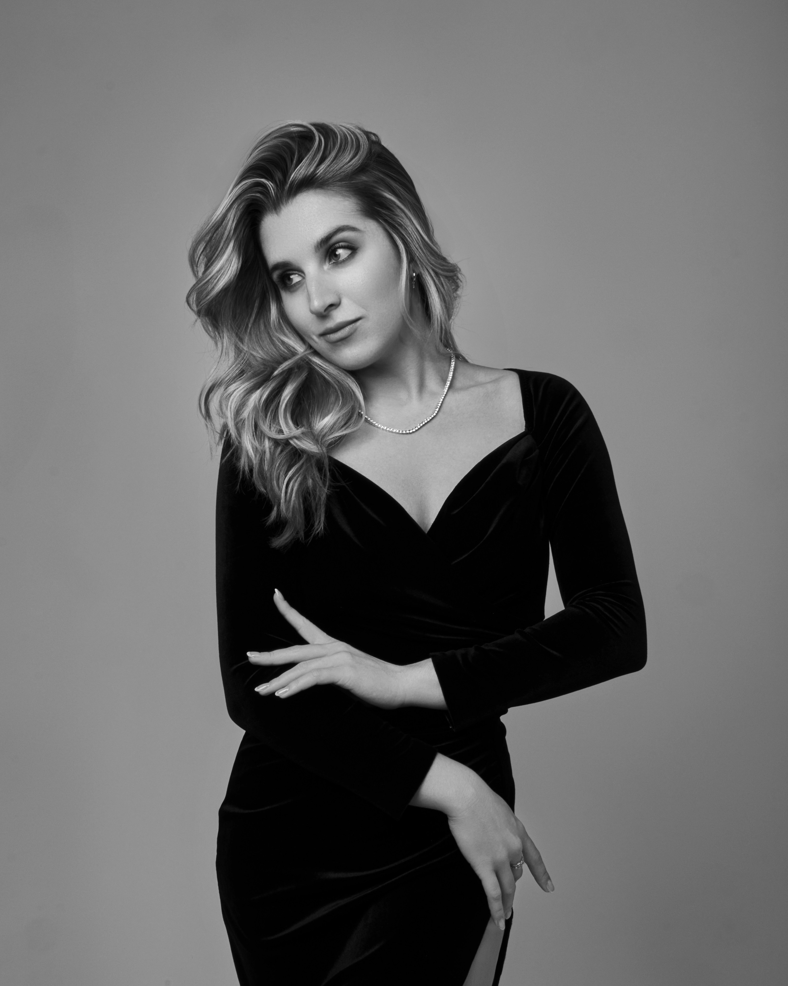 Salt Lake City empowerment portrait photography, black and white photo of elegant woman in black dress at Shtatolkina Studio