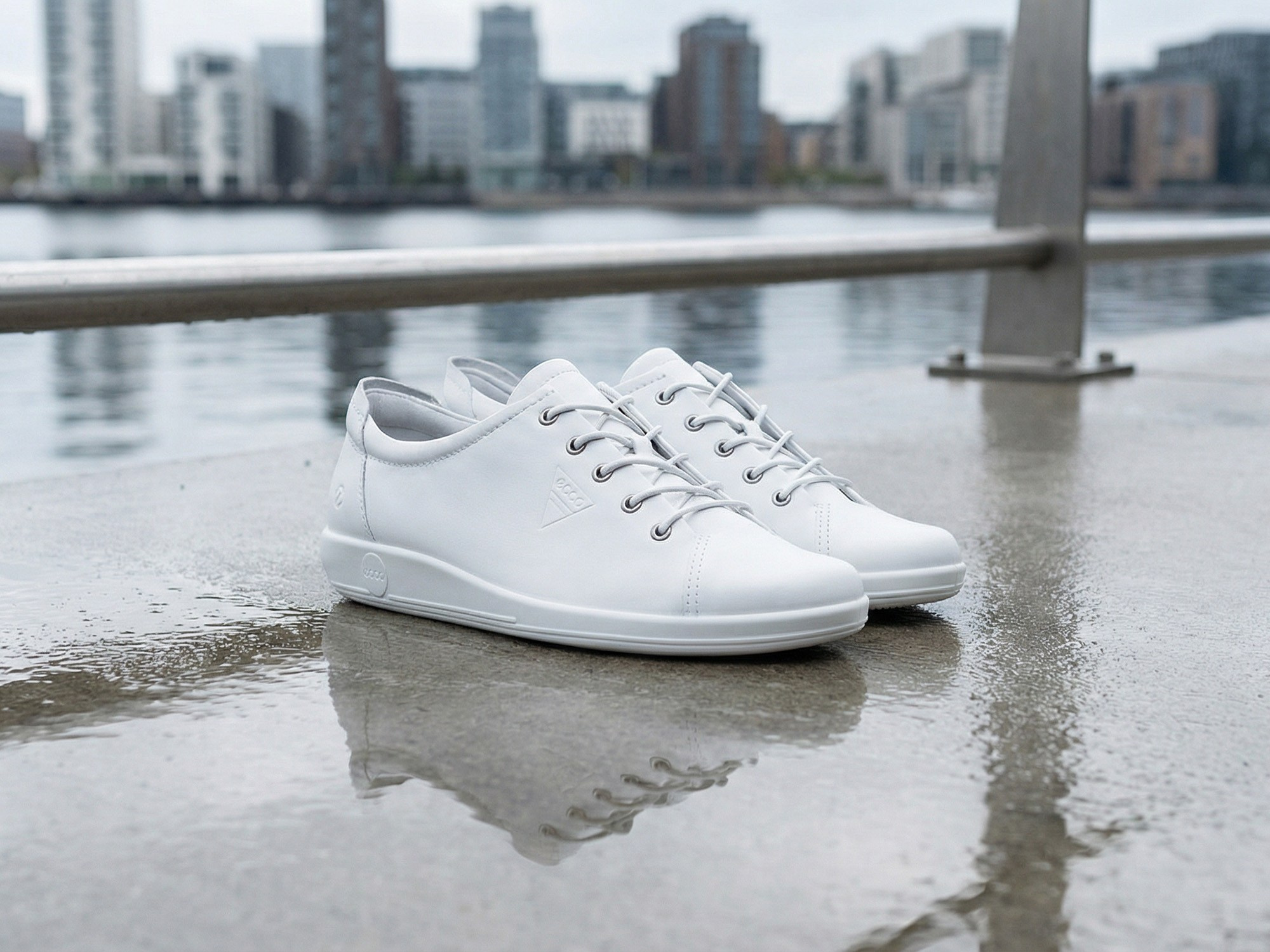 AI product visualization white sneakers urban waterfront lifestyle photography