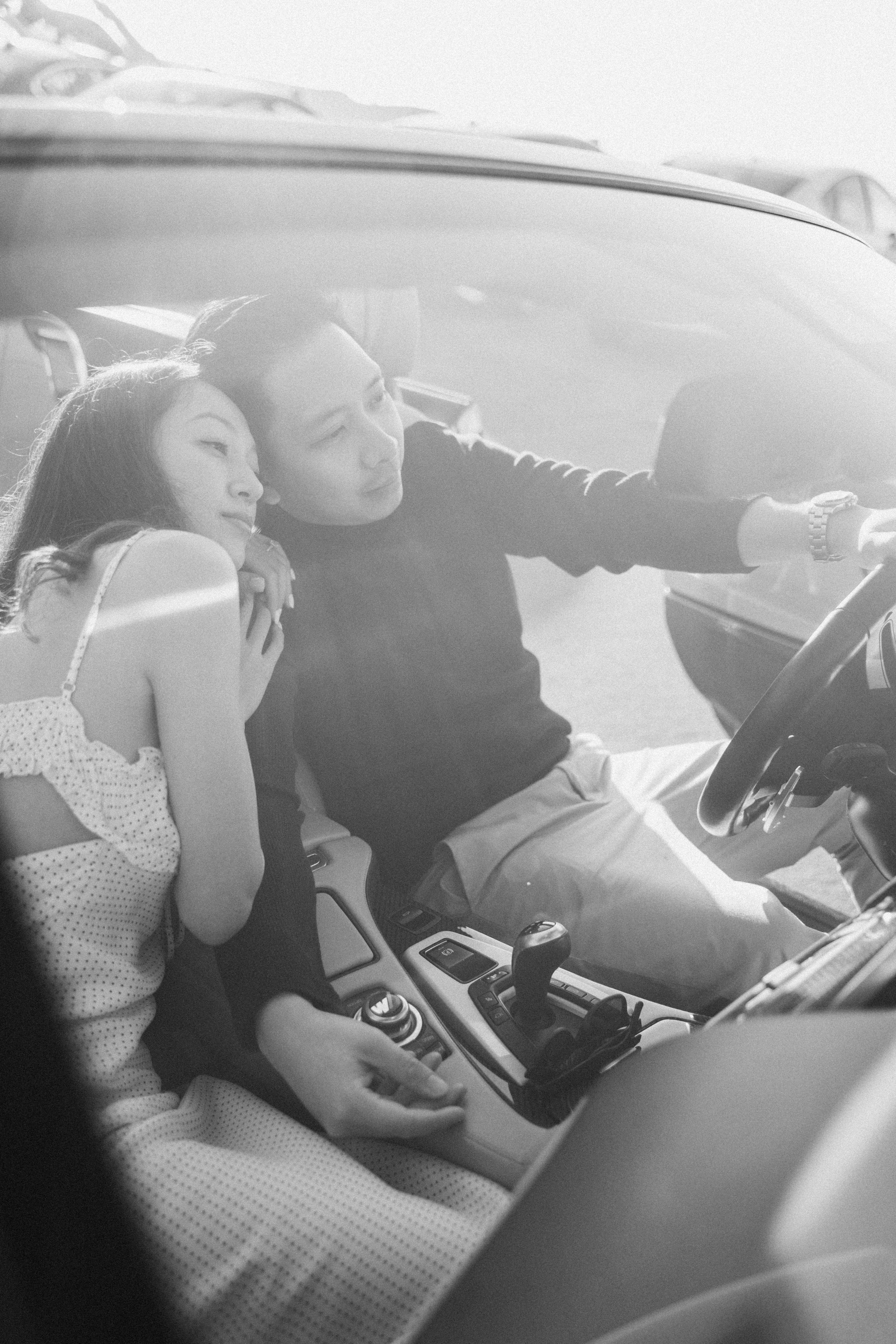 A photo shoot on the San Francisco beach at sunset. Engagement session. 