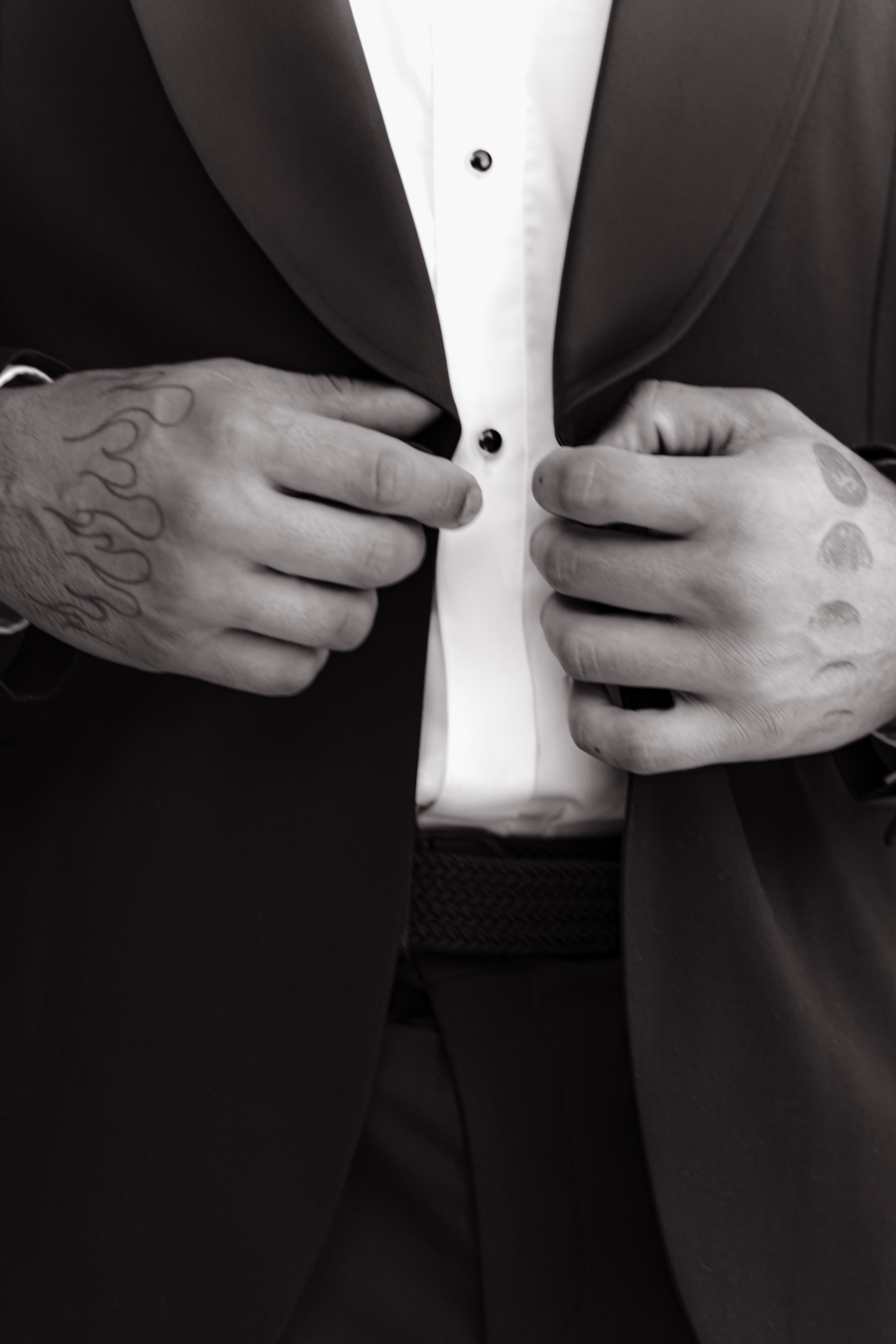     groom detail adjusting cufflinks Lake Como elopement