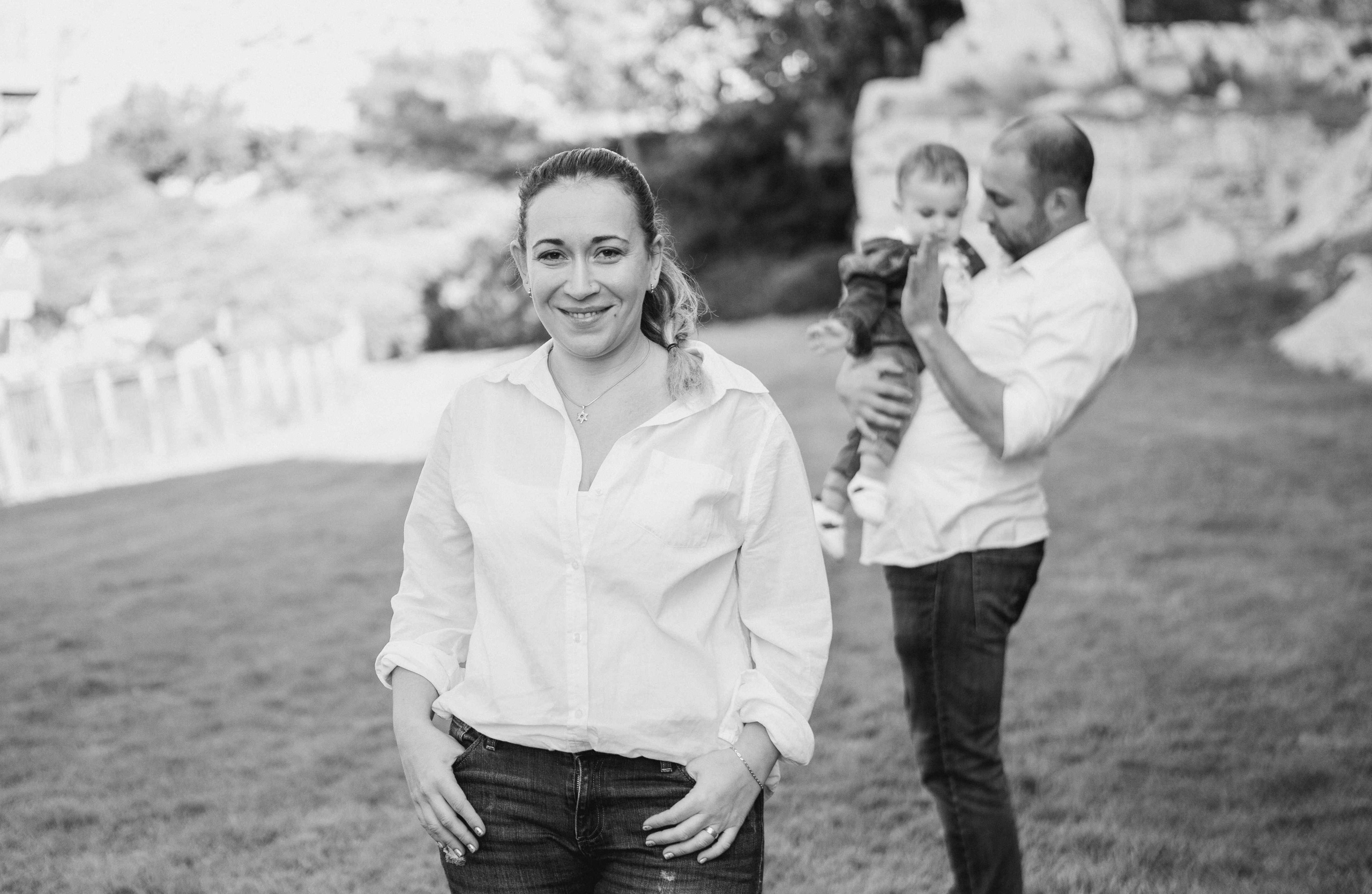 AT THE WALLS OF THE OLD CITY. PHOTOGRAPHER IN ISRAEL