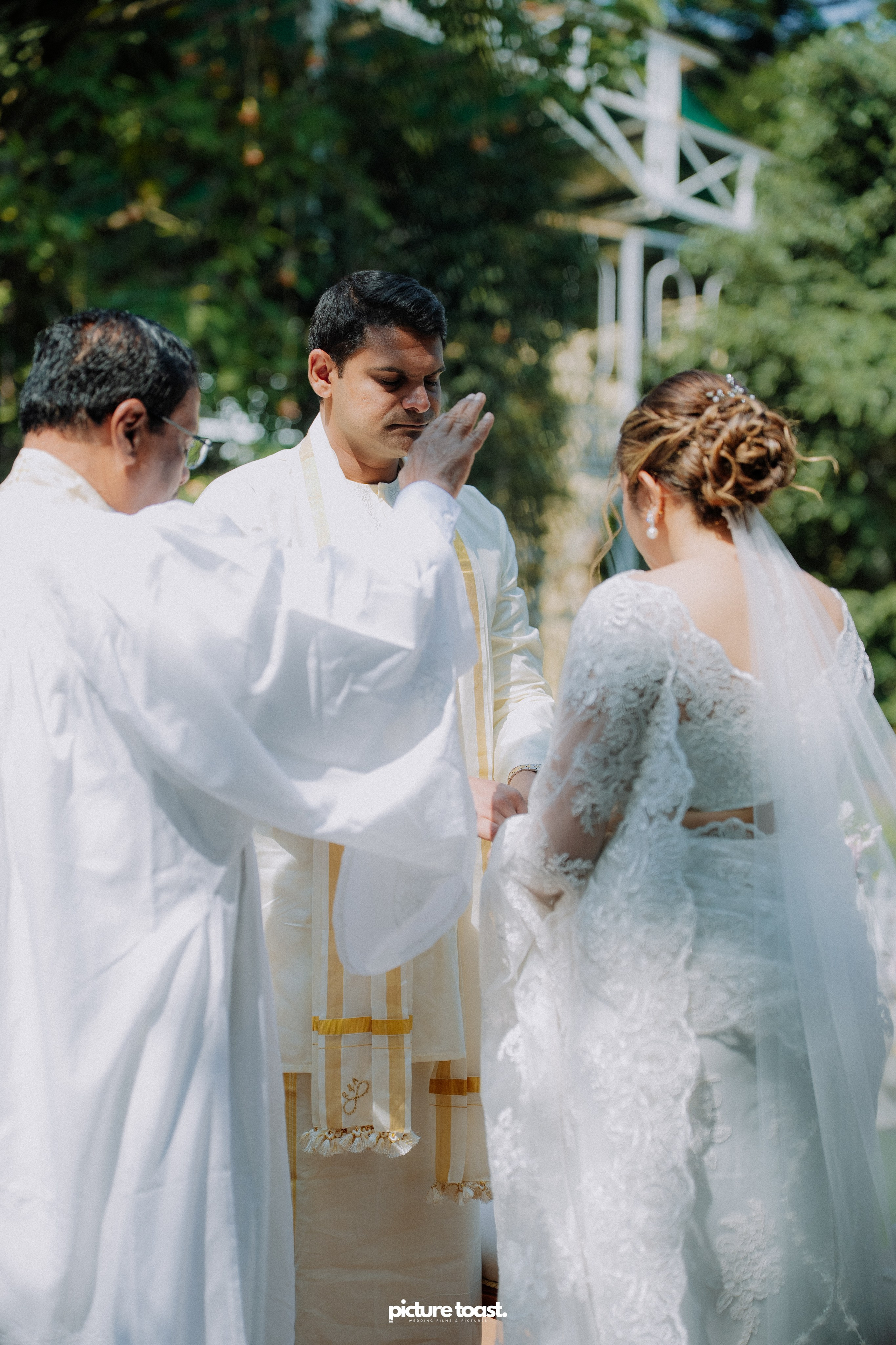Blessing of Rajiv & Aashna. Fine art Wedding Photographers in India & Canada