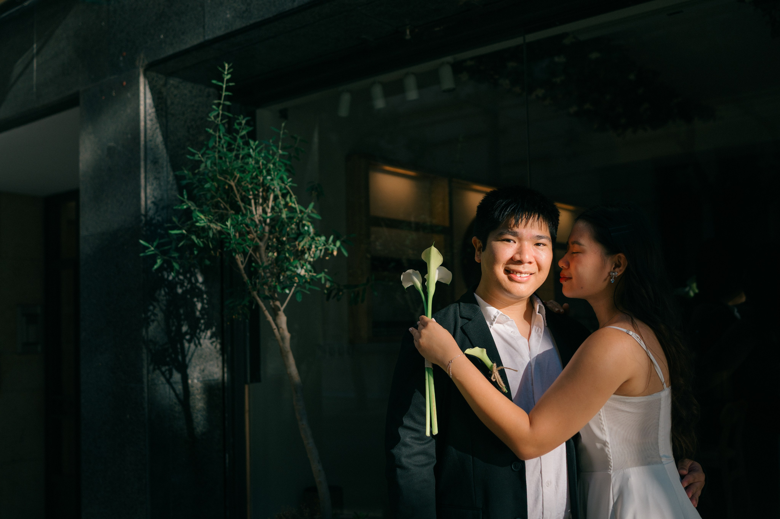 Cinematic portrait of a wedding couple embracing in Palma de Mallorca
