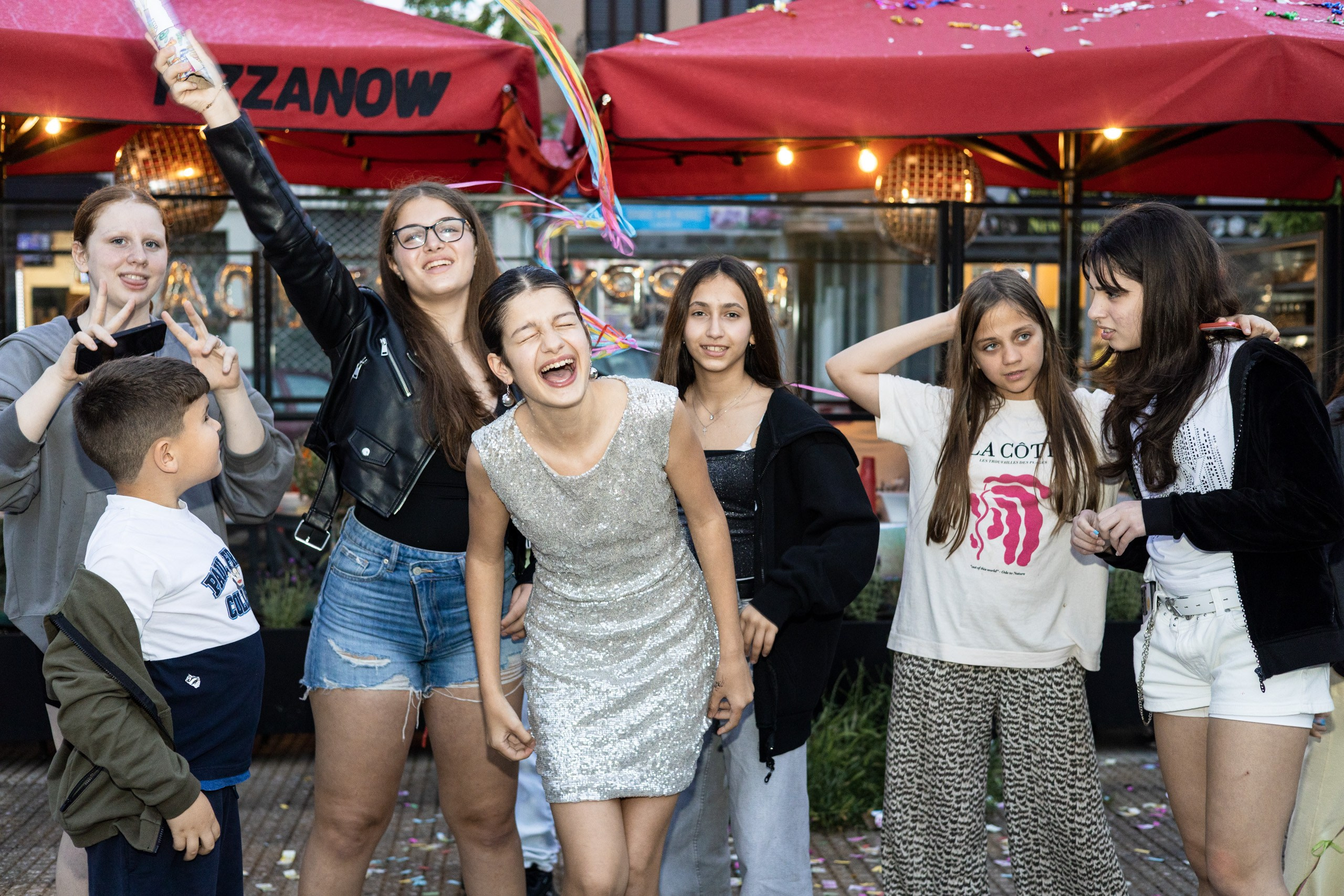 Teenagers dancing during a birthday celebration