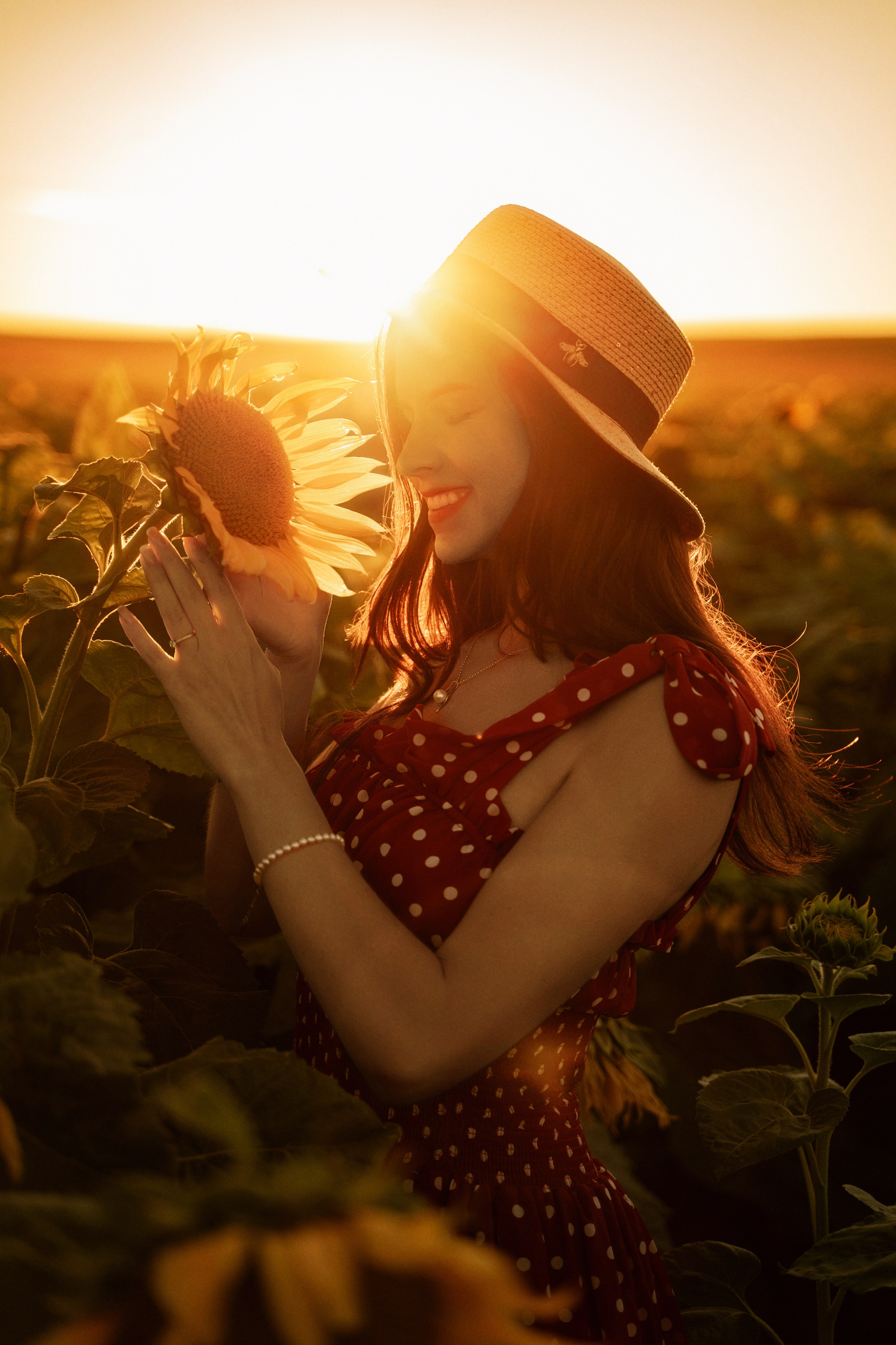 Young model posing at sunset in sunflower field, Marbella portrait photography