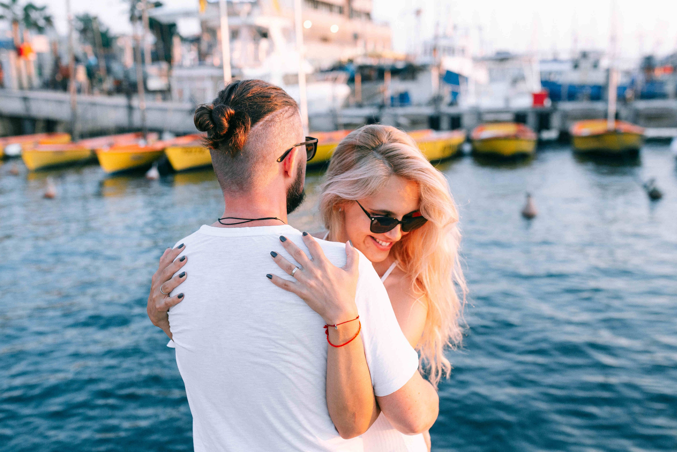 SUNSET IN JAFFO PORT. PHOTOGRAPHER IN ISRAEL