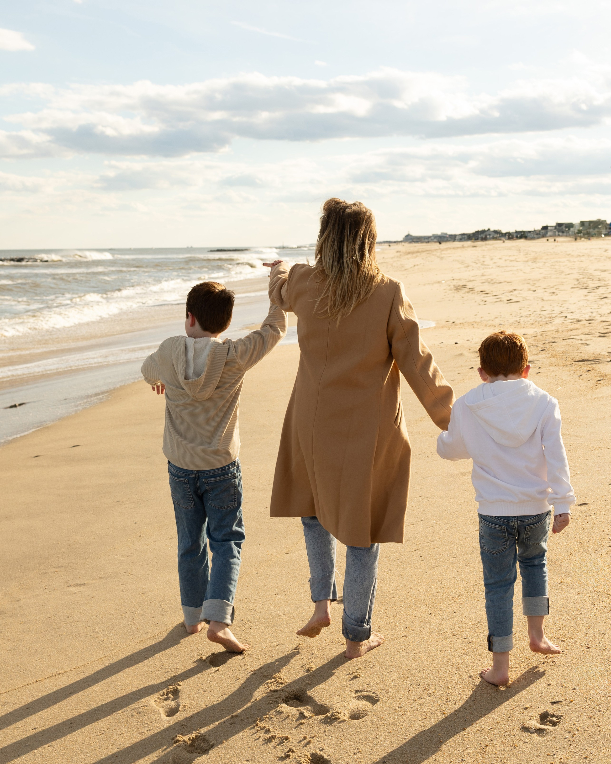 Sun, Sand, and Family Hugs. Family, lifestyle, and commercial photography in New York and New Jersey