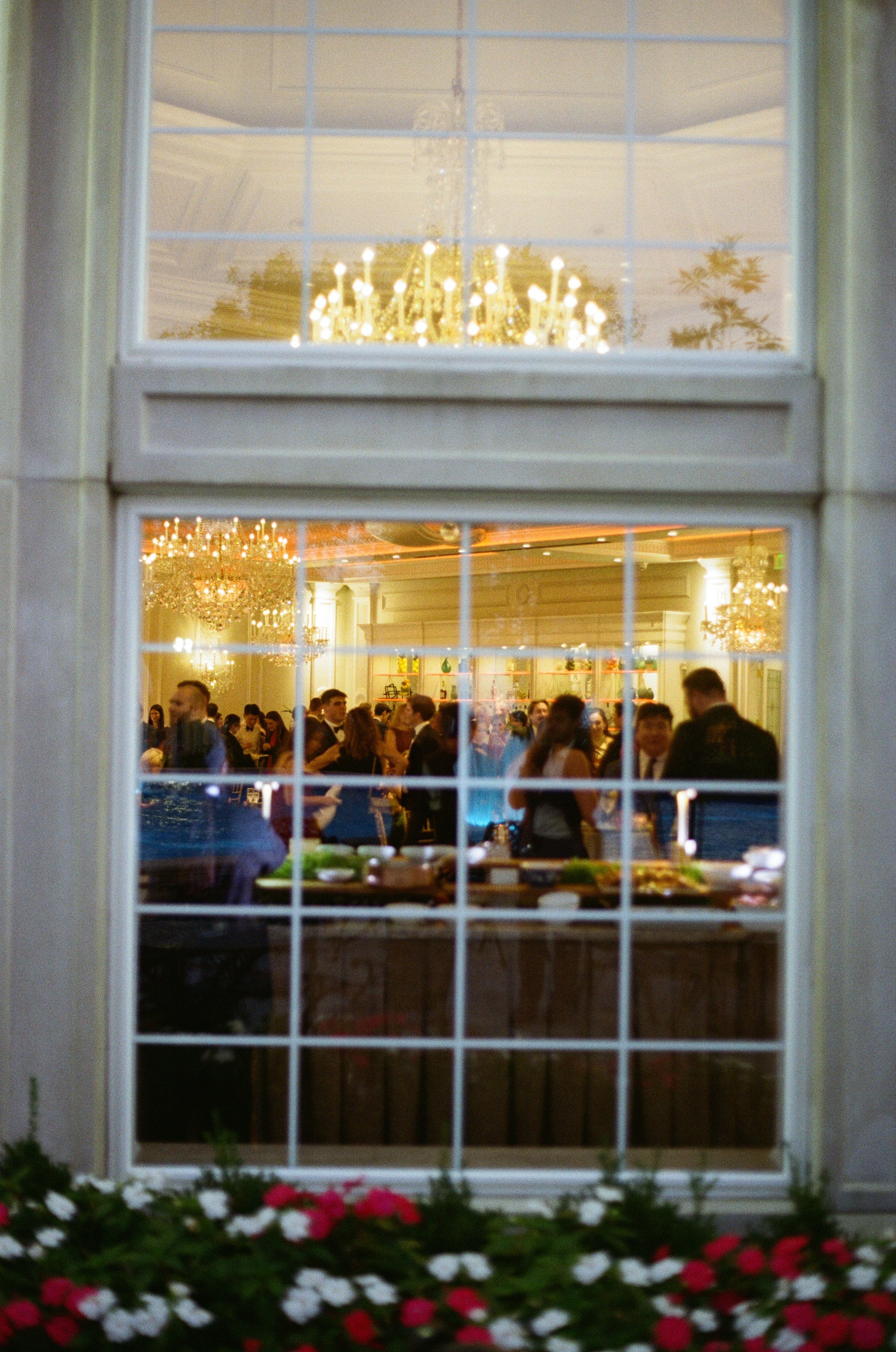 Elegant wedding reception bar decorated with flowers at The Rockleigh in New Jersey