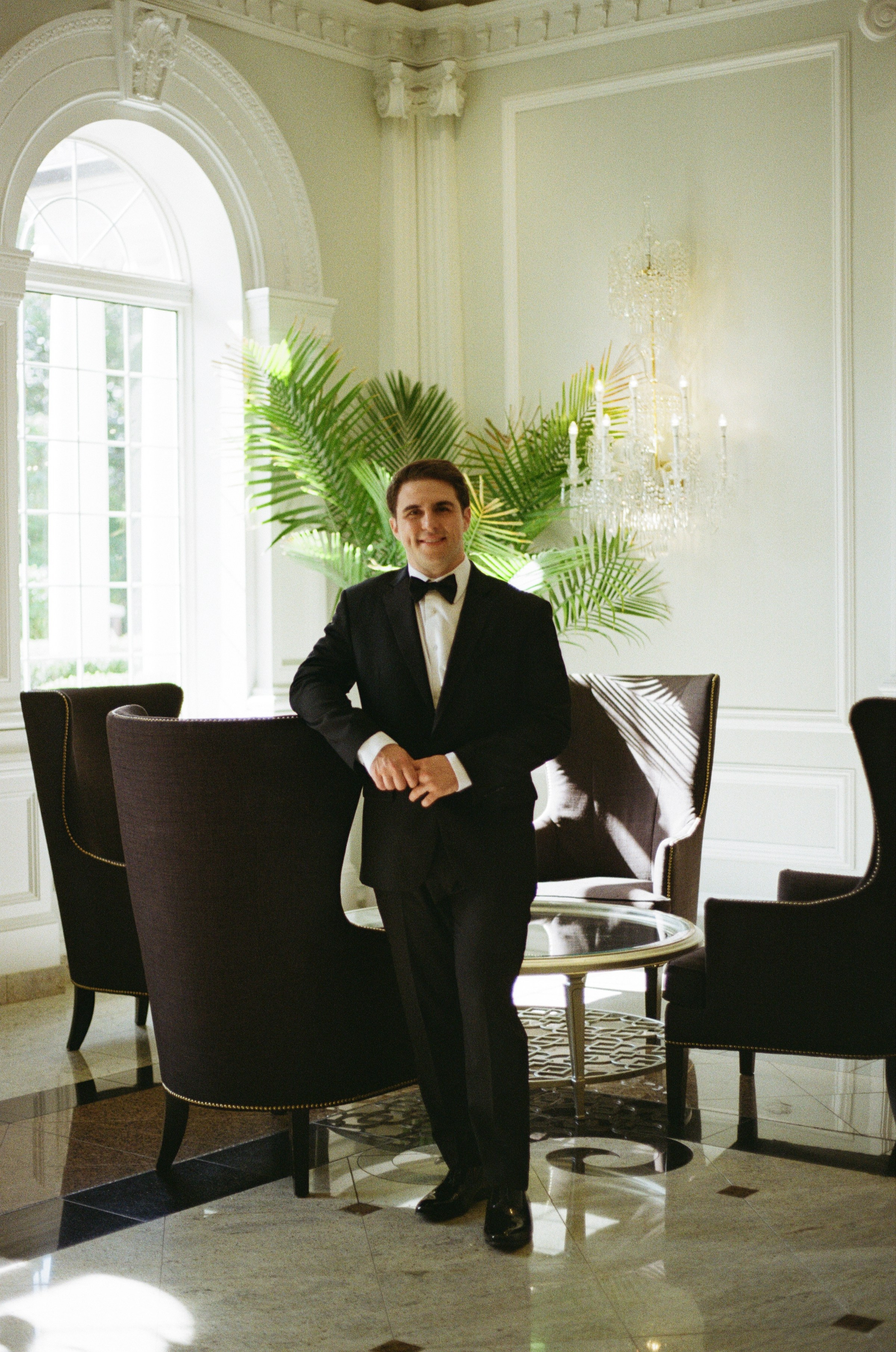 Natural light portrait of Michael in his wedding tuxedo