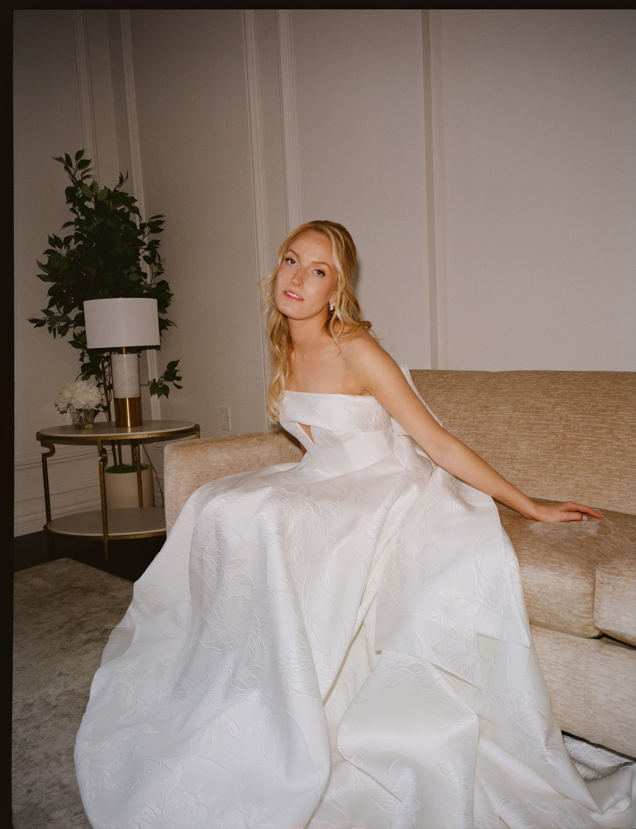 Editorial bridal portrait of Emily in her wedding dress on film