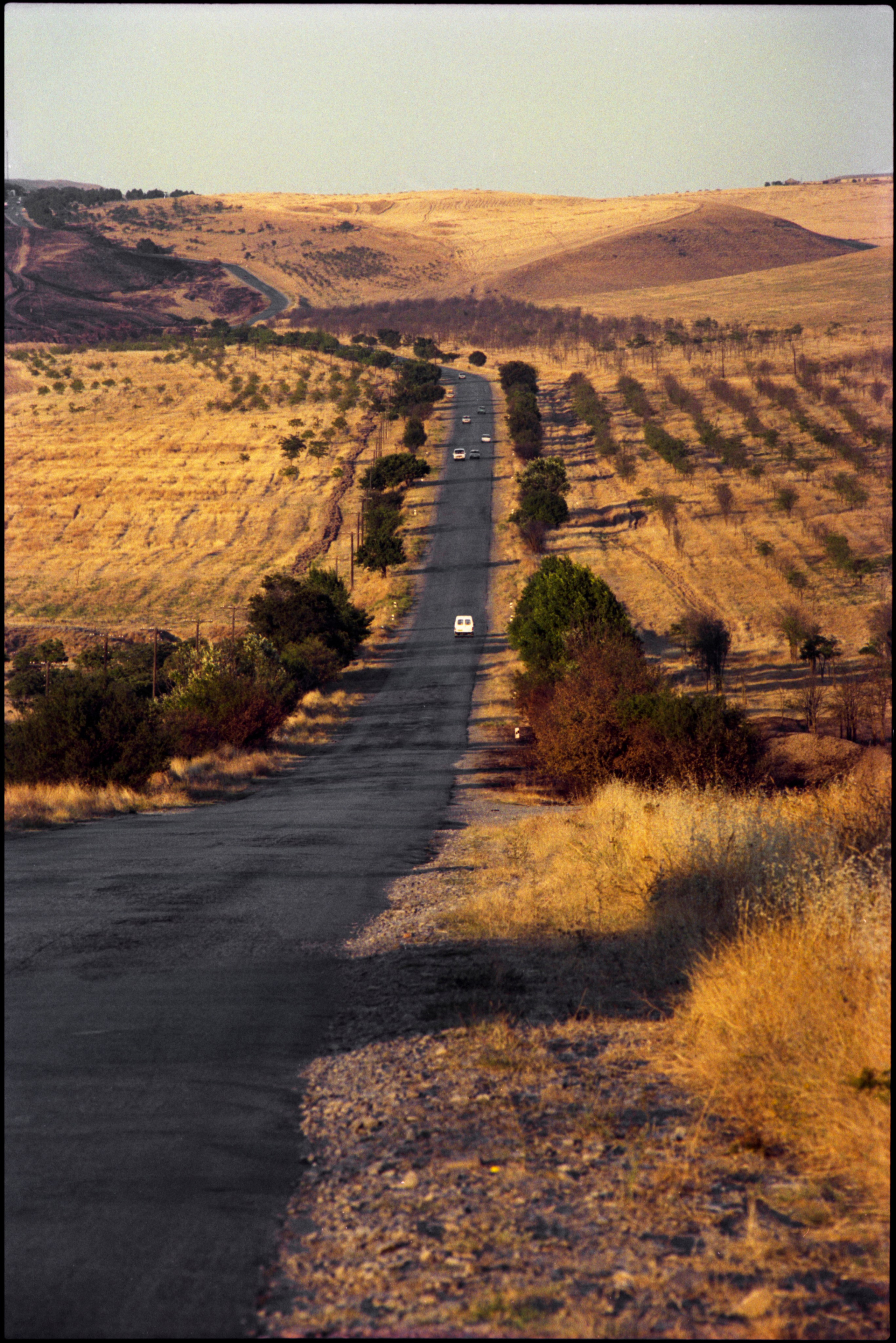 Yellow sun. Road.  Maraza, 2001
